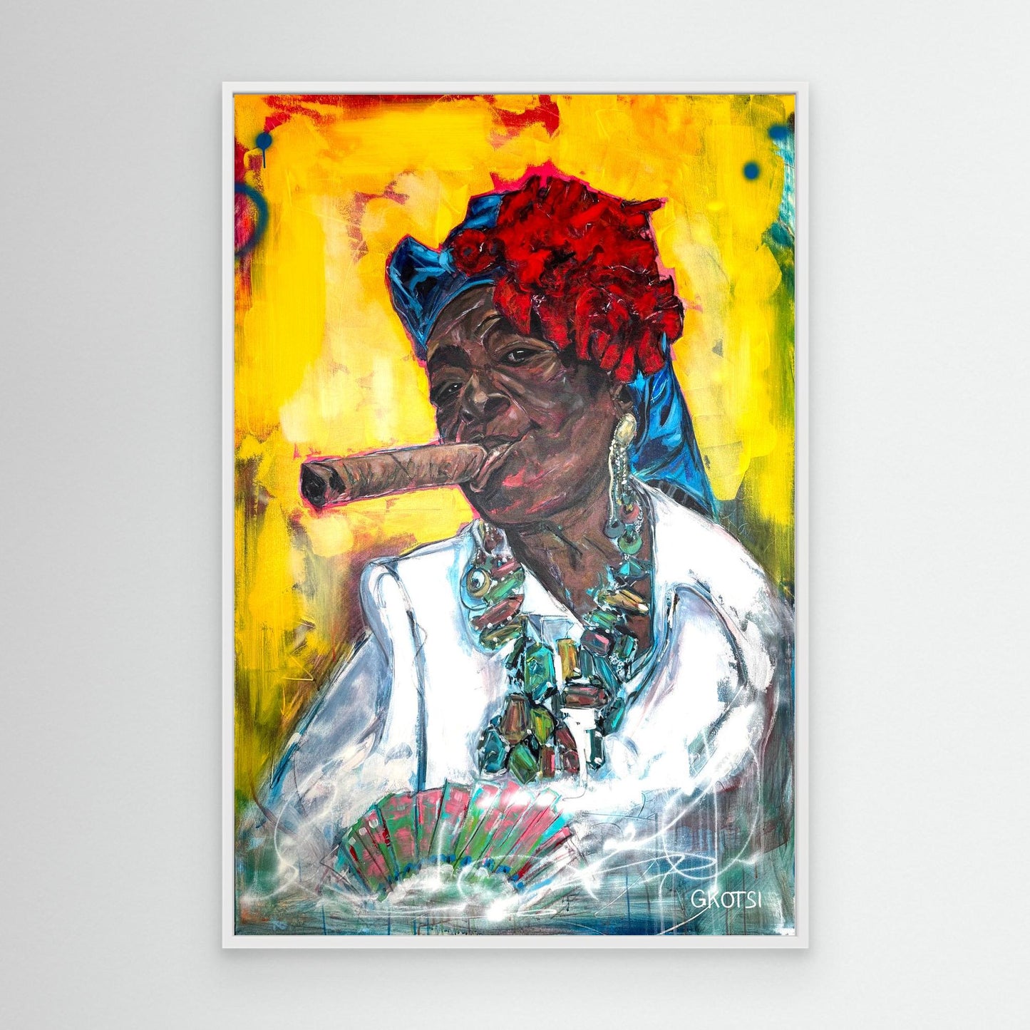 CUBAN WOMAN WITH CIGAR Canvas Print by Elena Gkotsi with white frame displayed on modern white wall