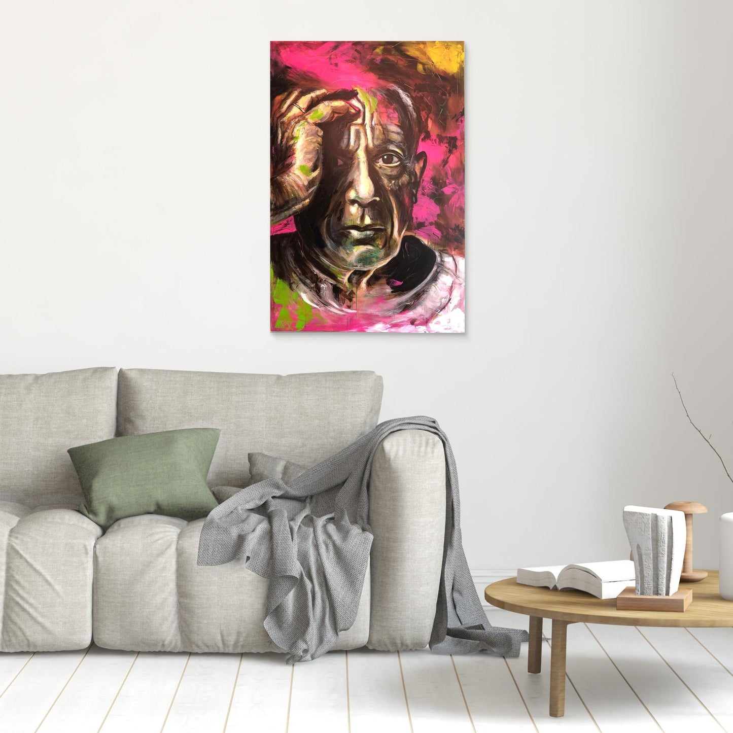 PABLO PICASSO canvas print hanging above gray sofa