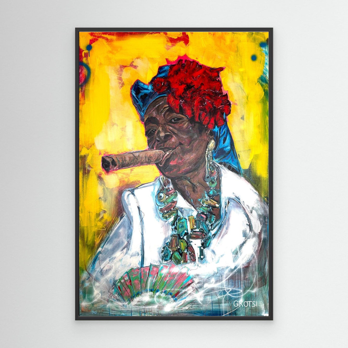 CUBAN WOMAN WITH CIGAR Canvas Print by Elena Gkotsi with black frame displayed on modern wall