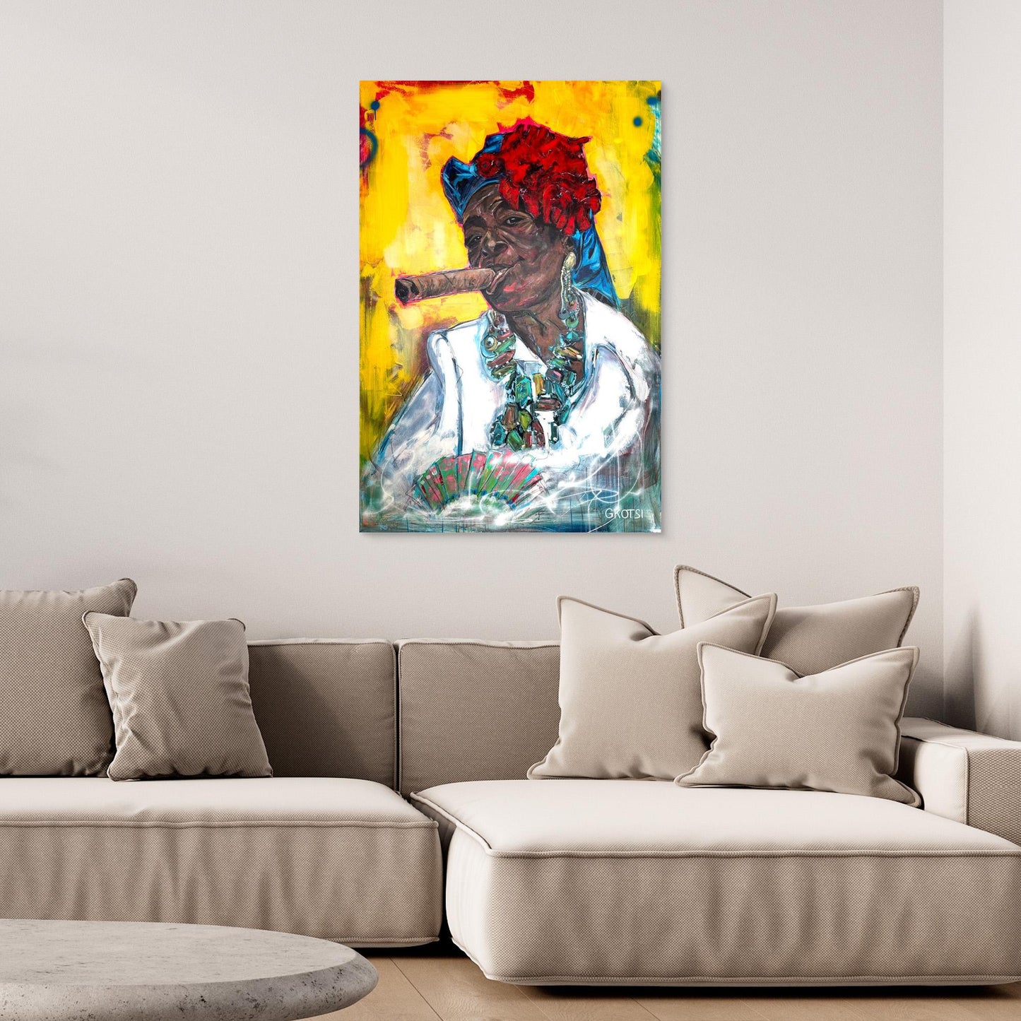 CUBAN WOMAN WITH CIGAR Portrait Canvas Print hanging above beige sofa in stylish interior setting