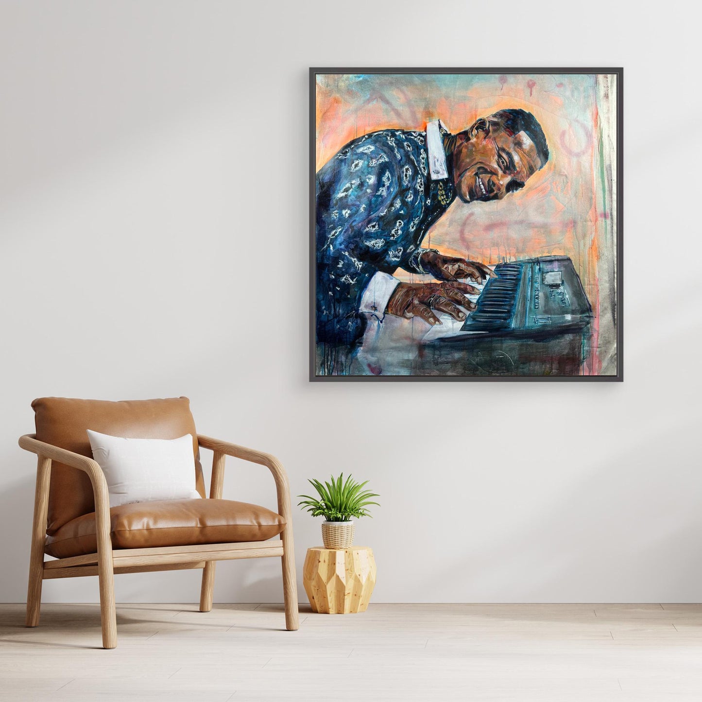 MANOLITO Y SU TRABUCO canvas artwork displayed above stylish chair