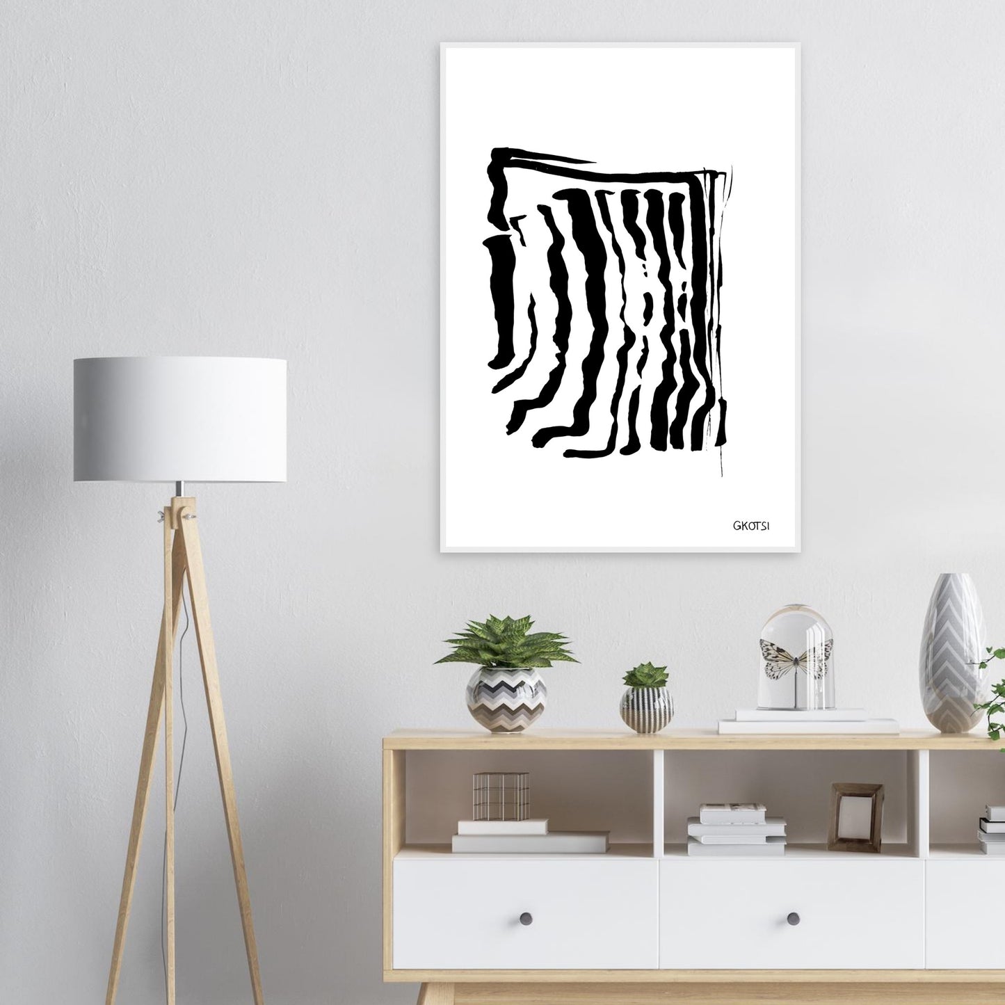 ADAPTING poster print above dresser in room interior