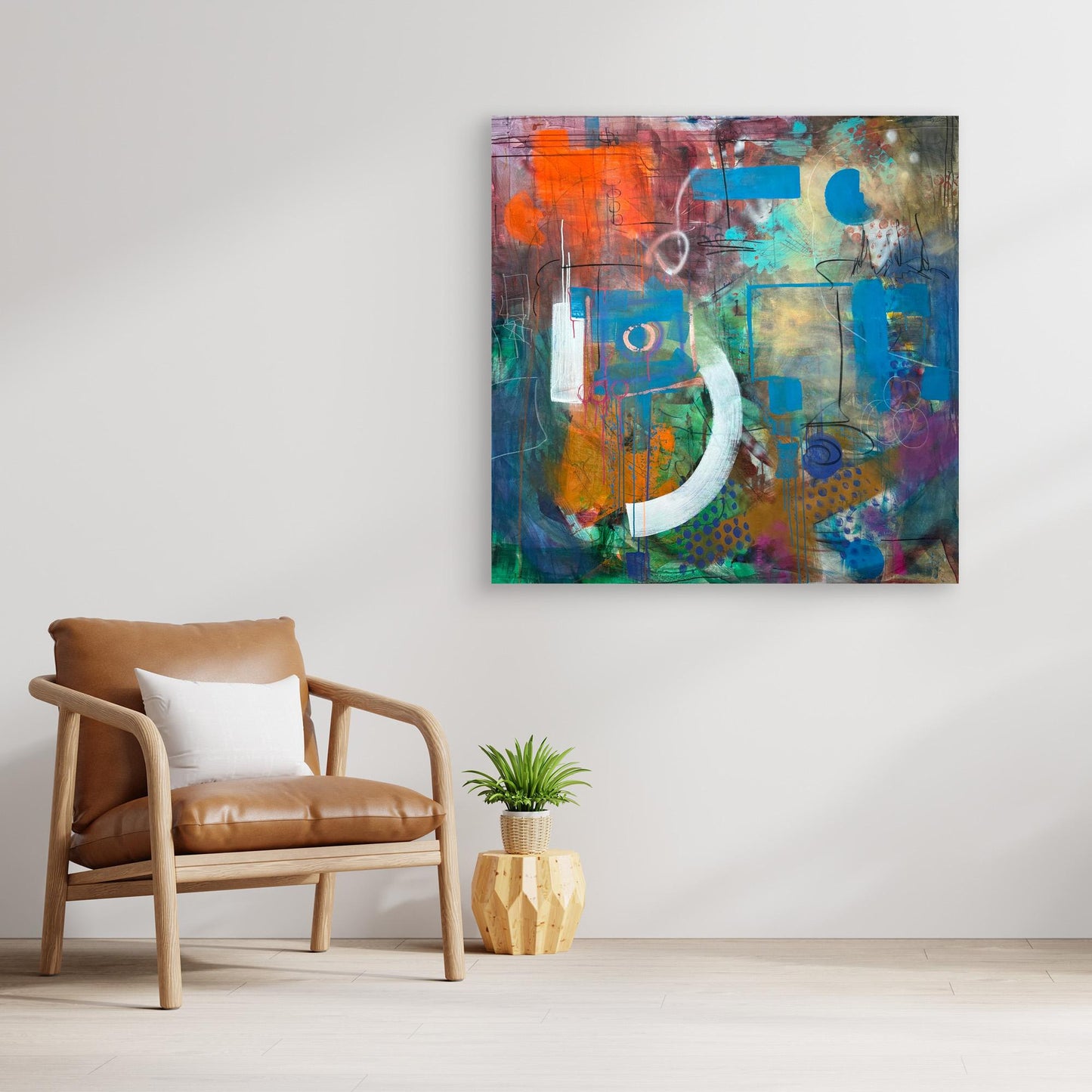 ALWAYS HERE abstract canvas print above chair with small plant