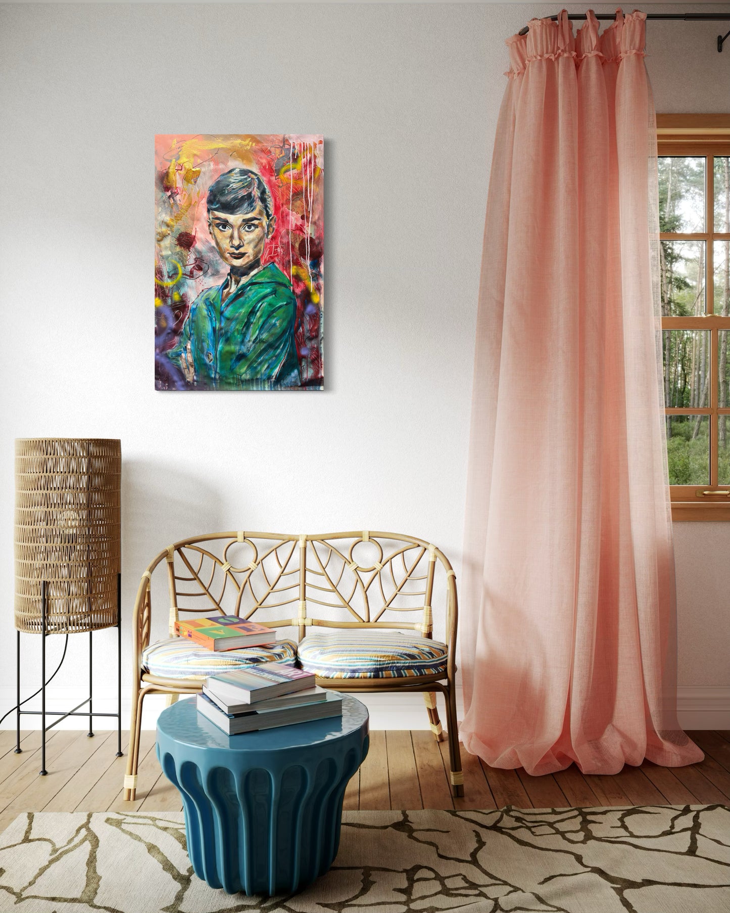 Audrey Hepburn painting next to rose curtain