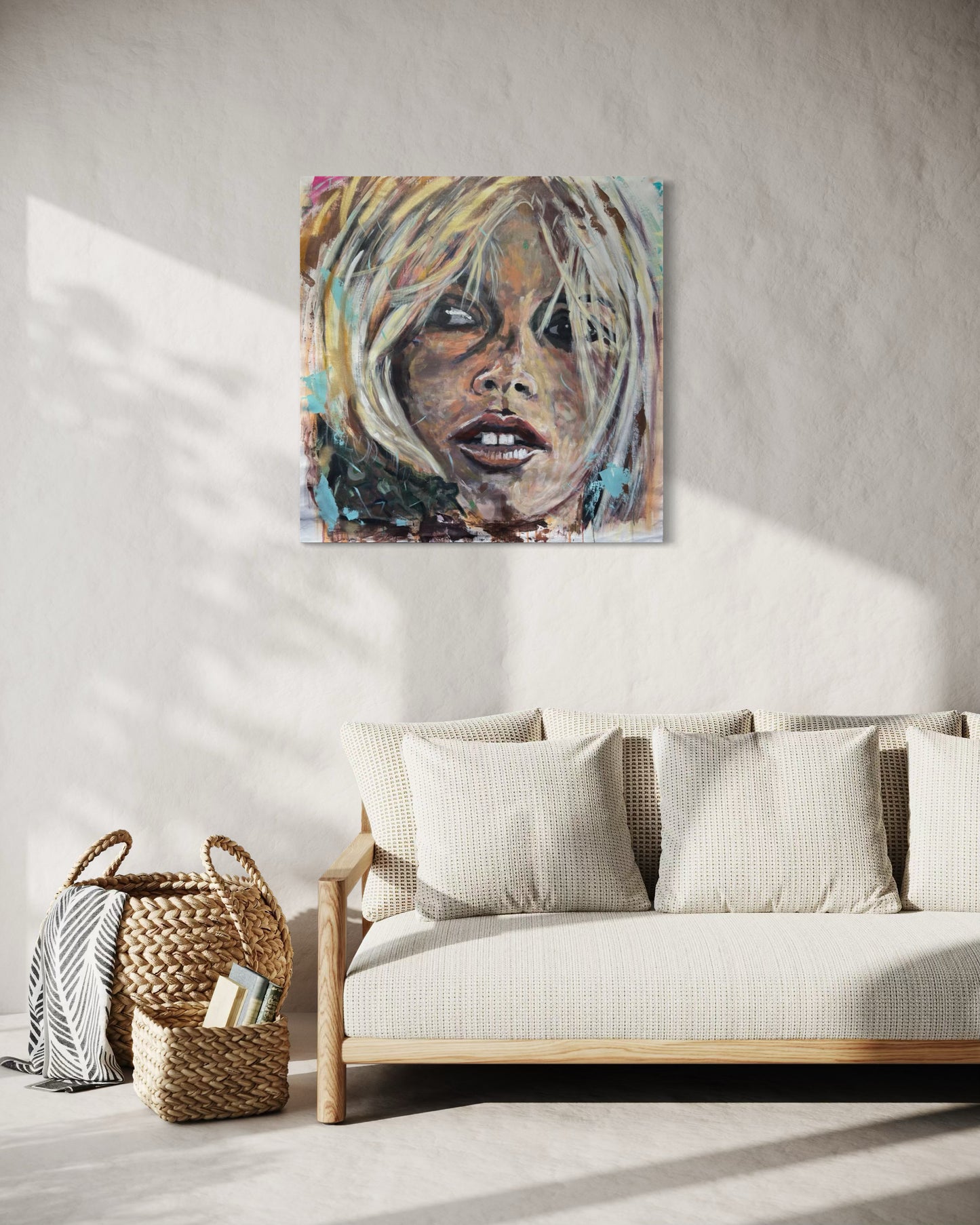 Brigitte Bardot artwork on beige wall with beige sofa