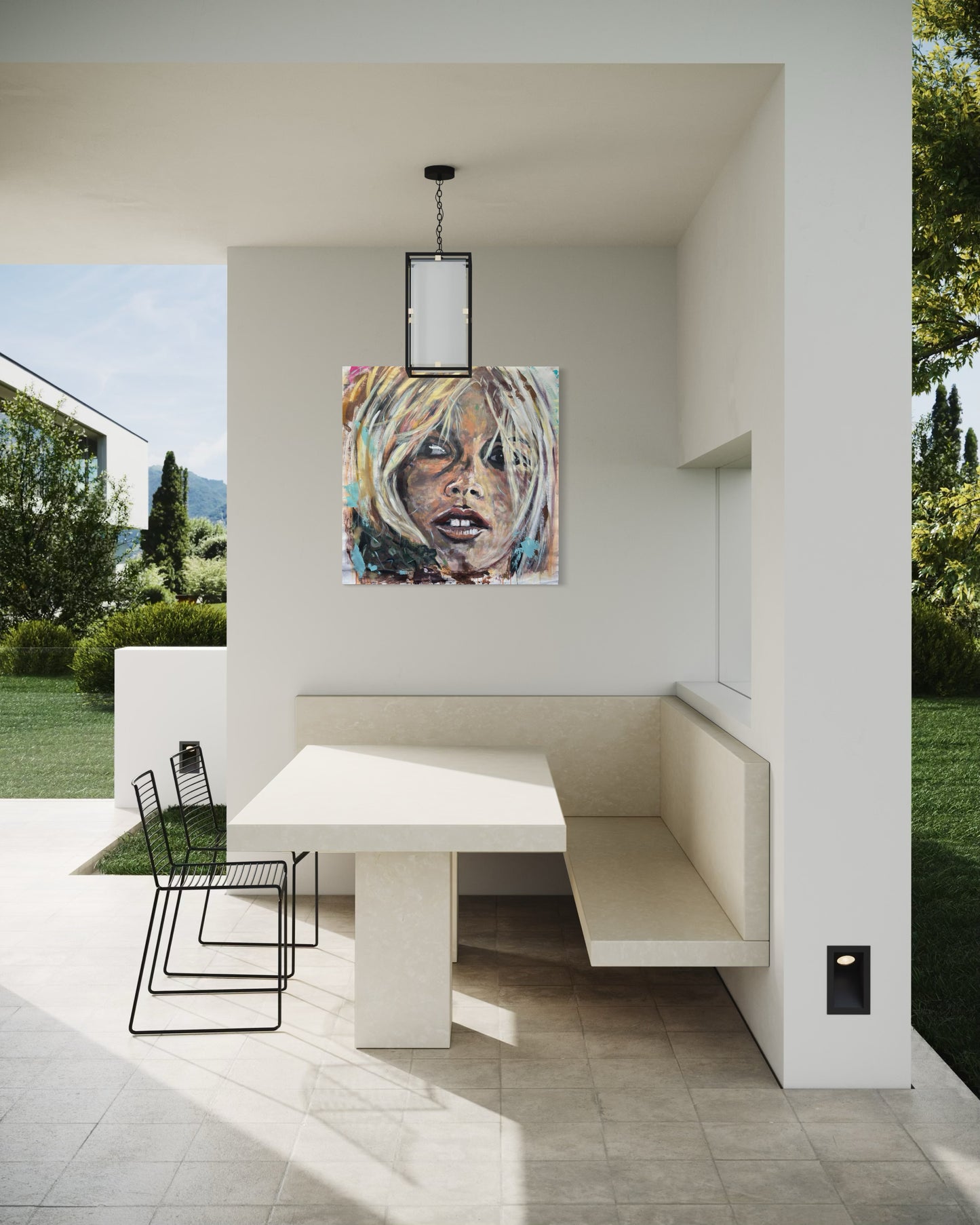 Brigitte Bardot artwork outdoors above dining table corner