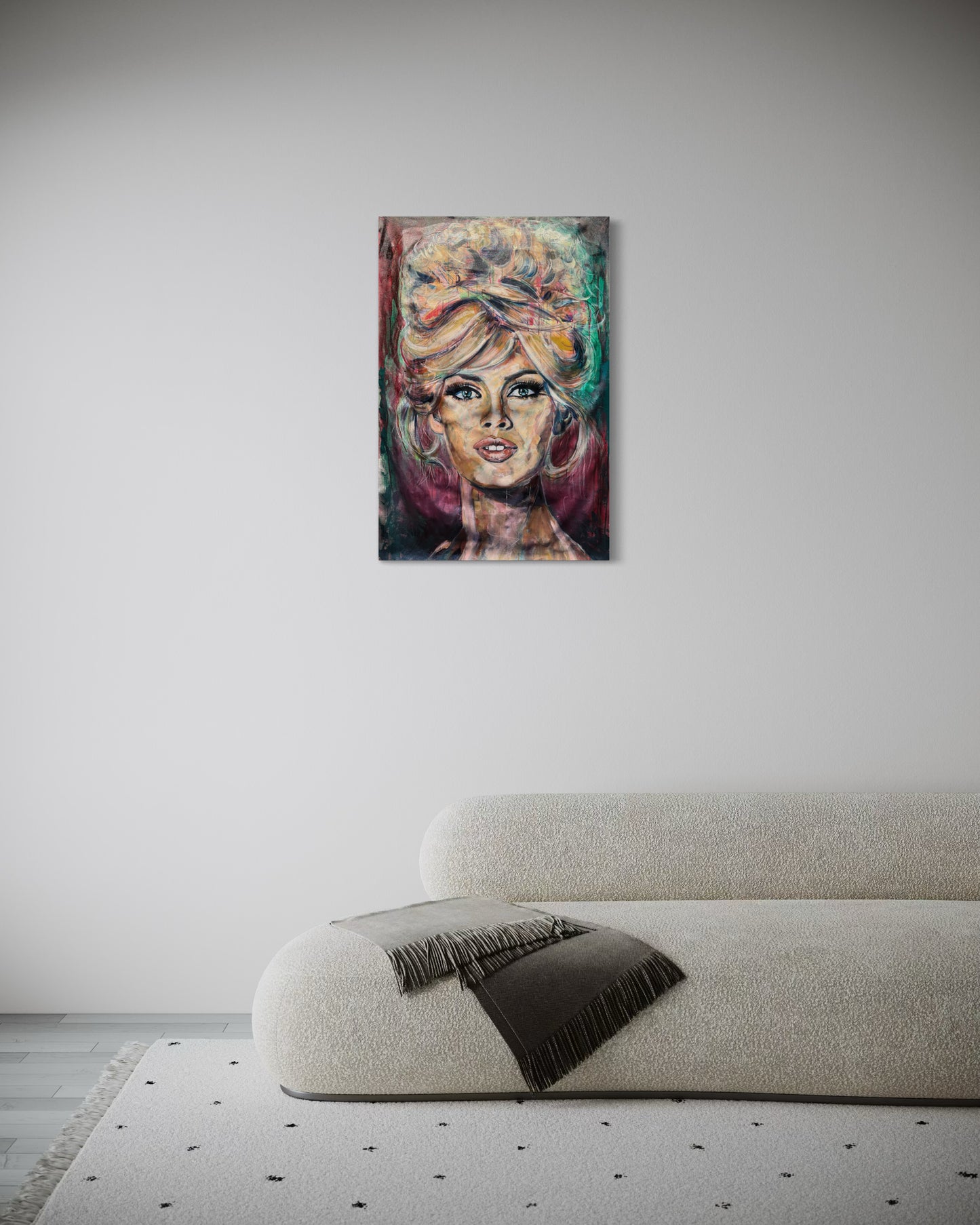 Brigitte Bardot artwork with minimal white sofa
