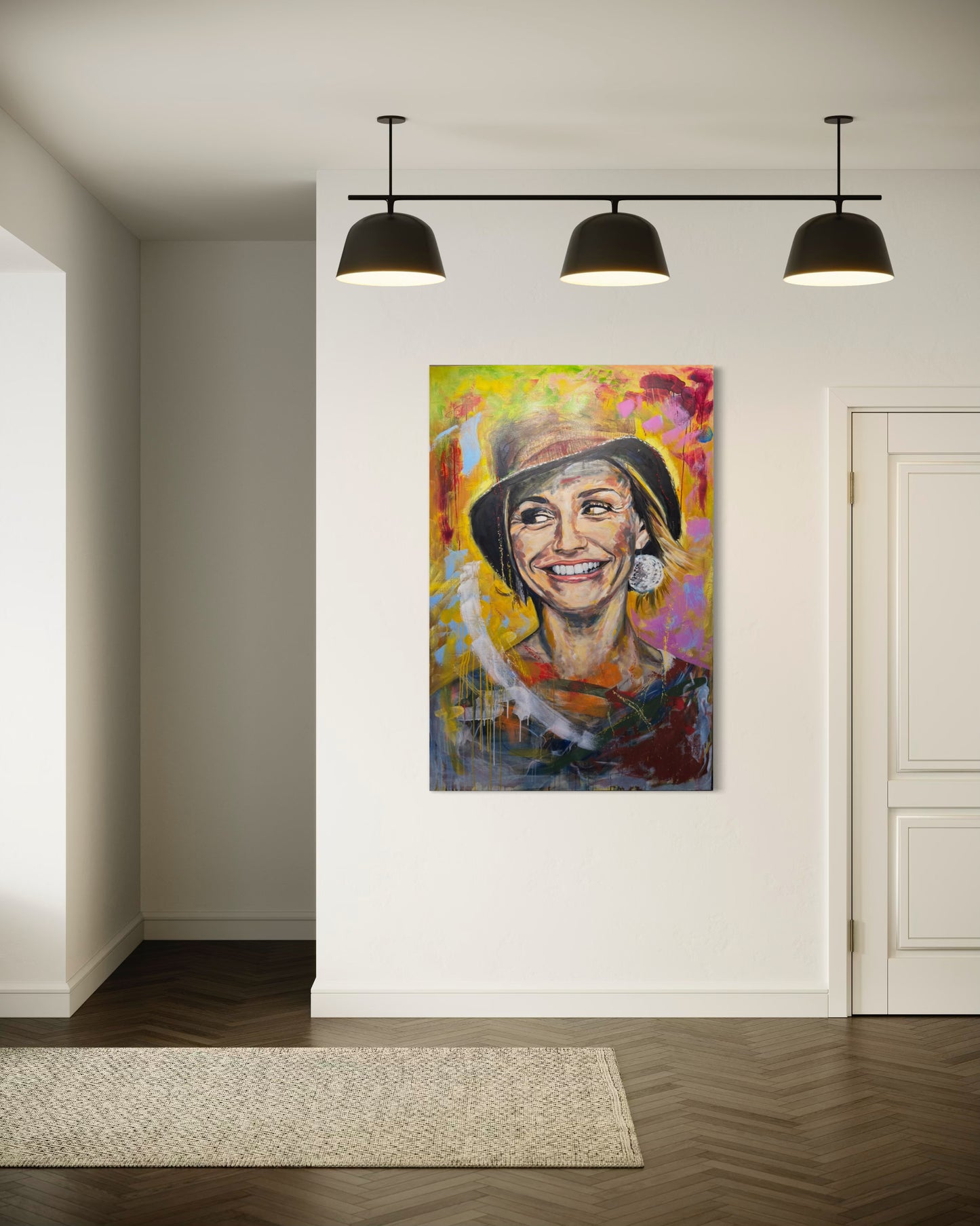 Cameron Diaz artwork in hallway with modern spotlight