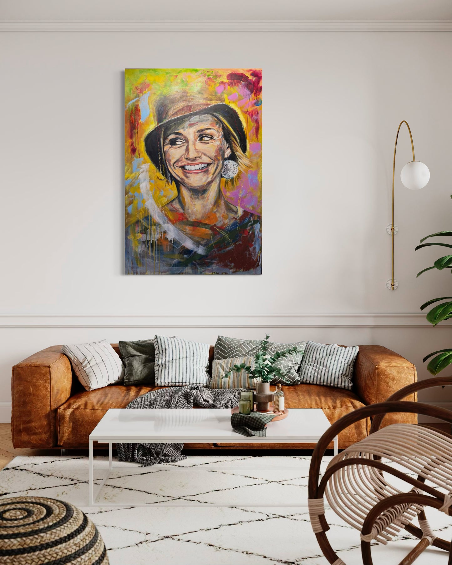 Cameron Diaz artwork in warm room with pleasant couch in warm tones