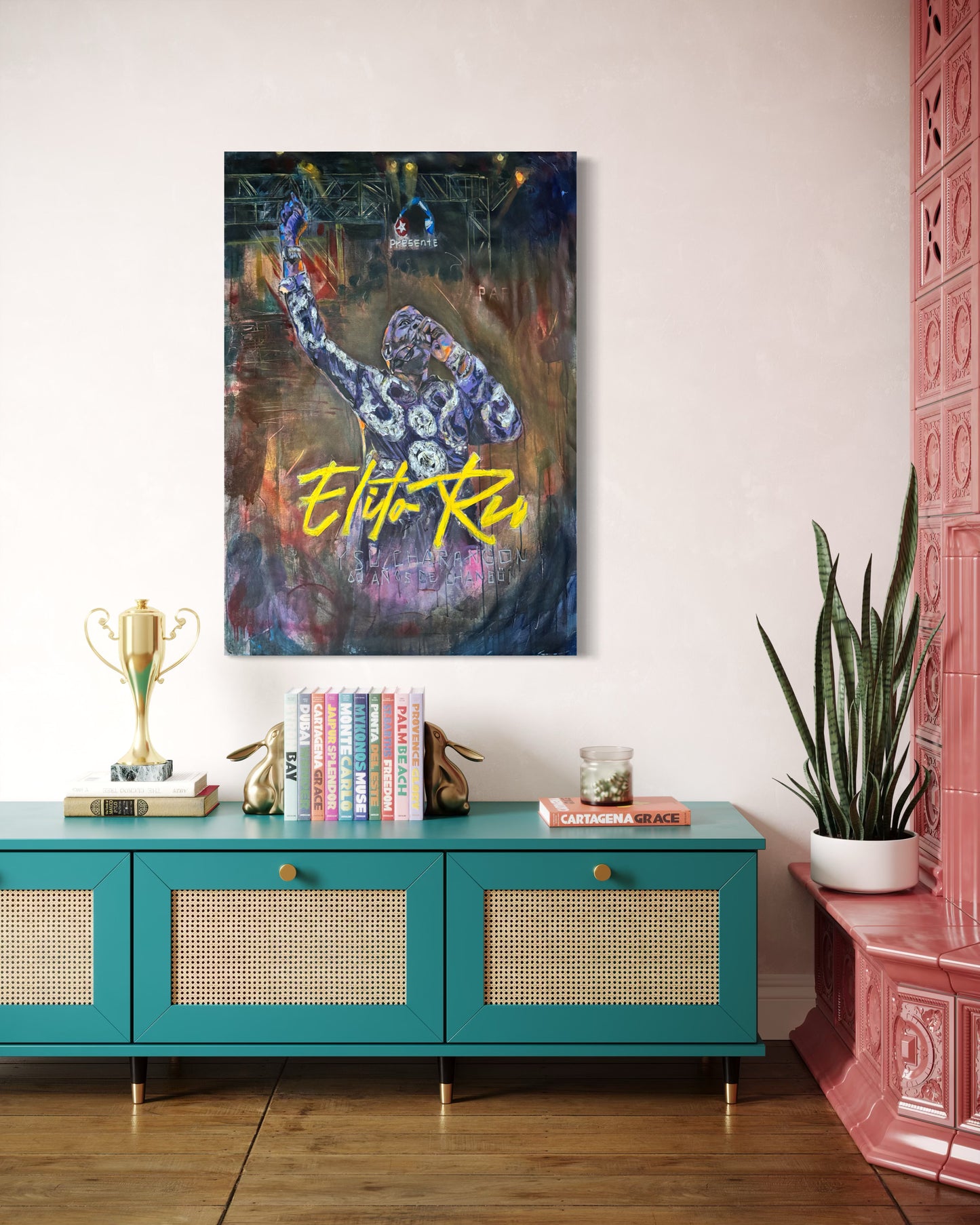 Elito Reve portrait painting above low turquoise style dresser