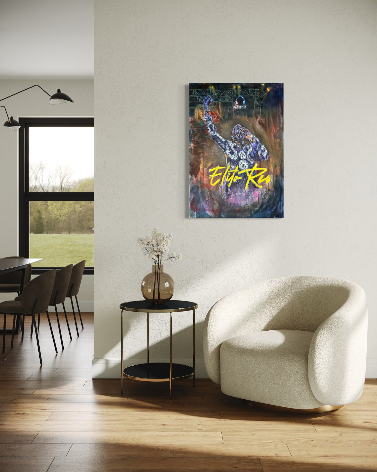 Elito Reve portrait painting above white sofa with cushions