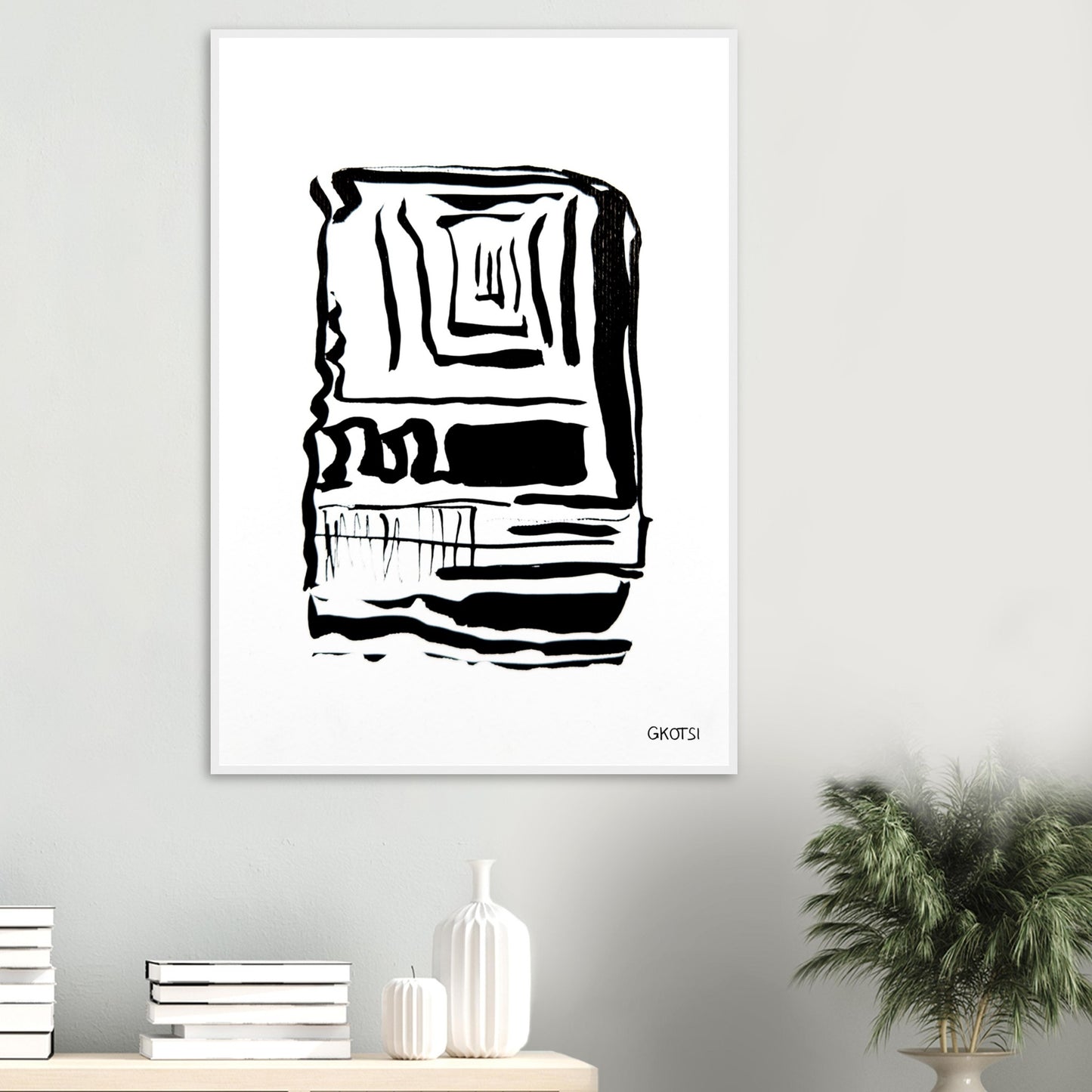 FOCUS poster print above table with small plant