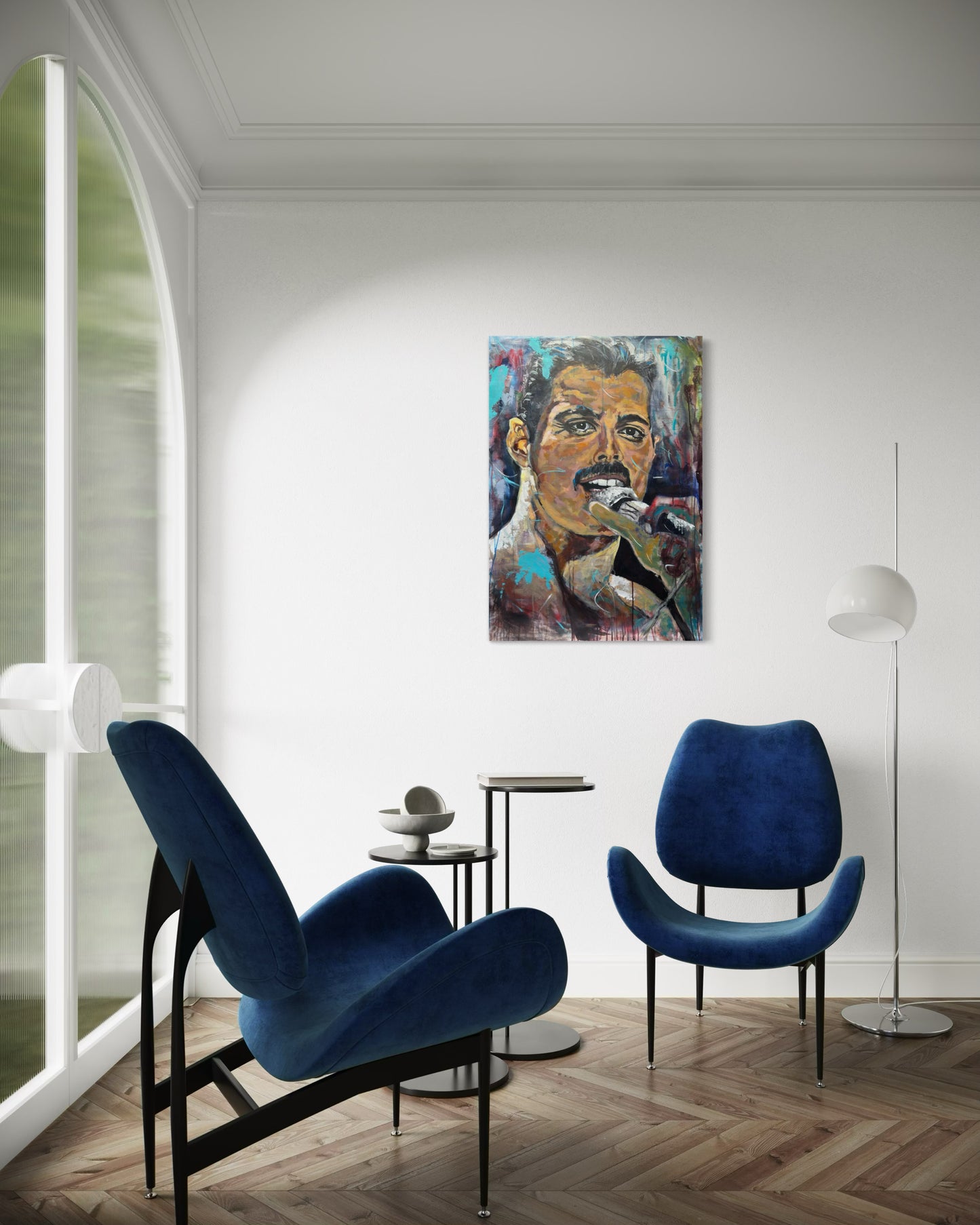 Freddie Mercury Painting in room with blue couch armchair