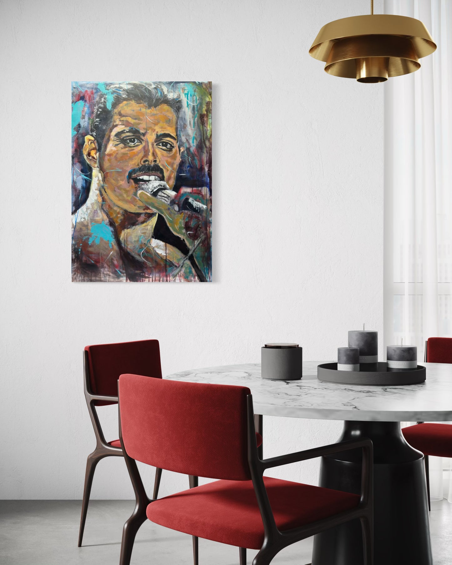 Freddie Mercury Painting in room with round table and red chairs