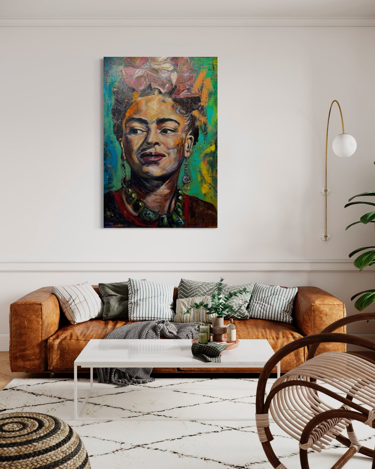 Frida Kahlo painting above long comort couch