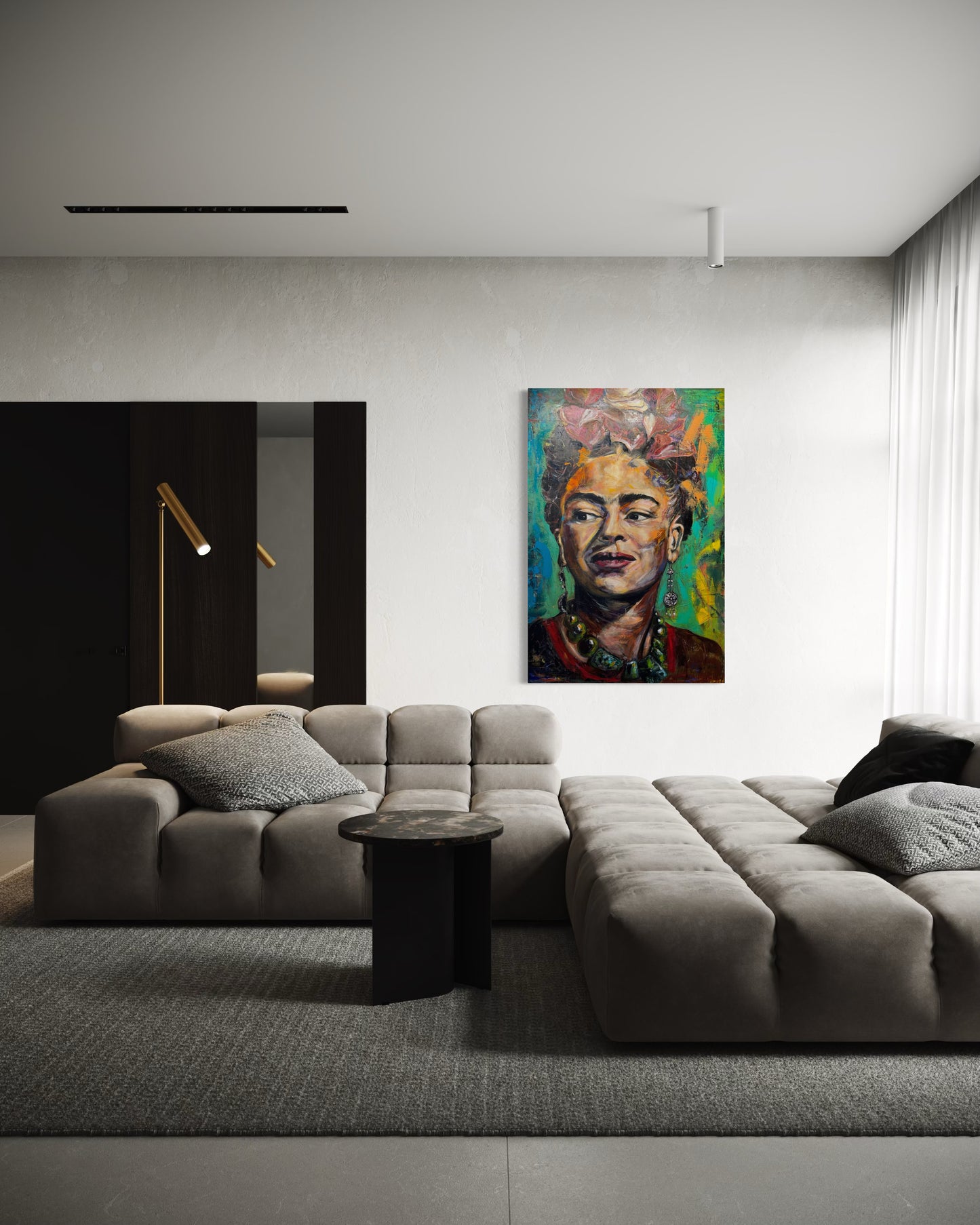 Frida Kahlo painting in gray living room with upholstered couch