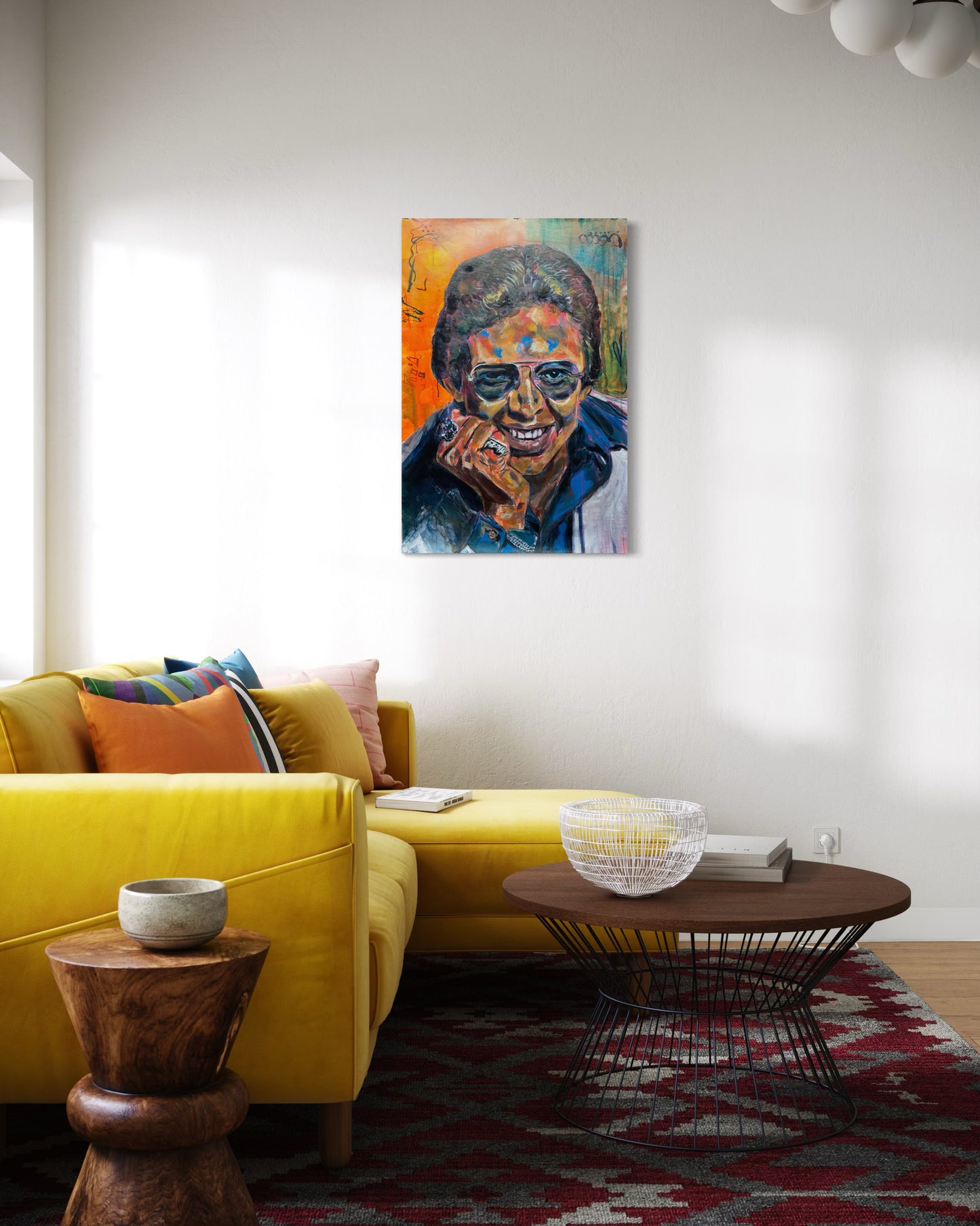 Hector Lavoe Painting above yellow velvet couch