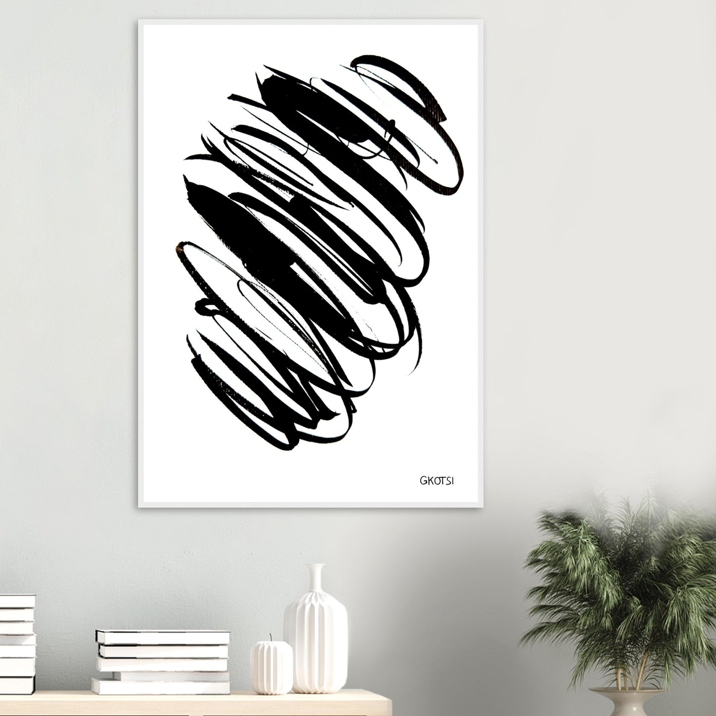 IN THE CURRENT poster print above table with small plant