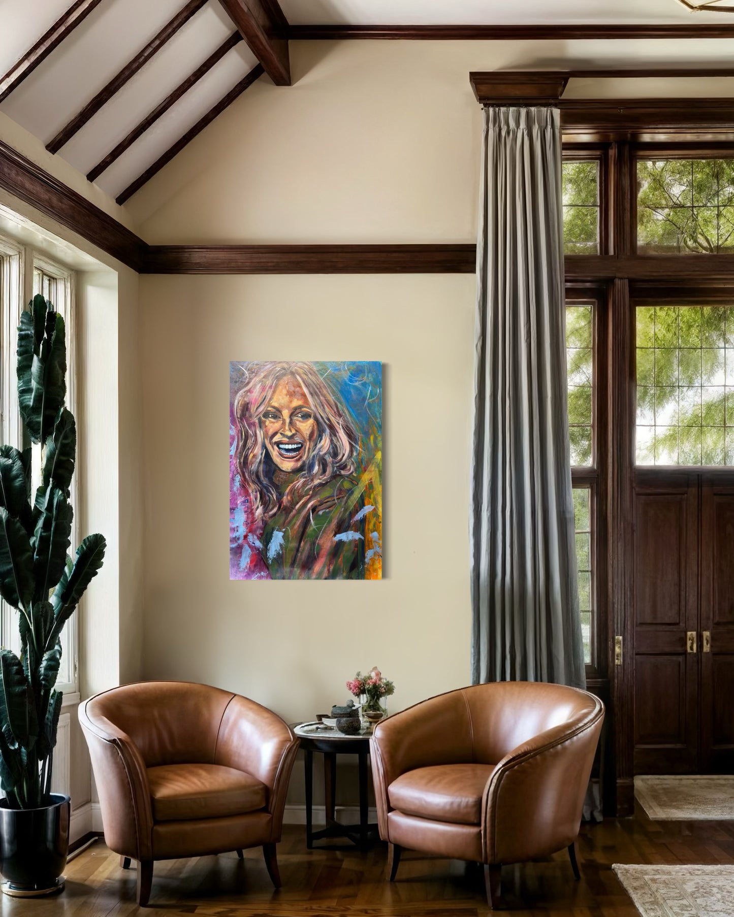 Julia Roberts Painting in living room with two leather arm chairs