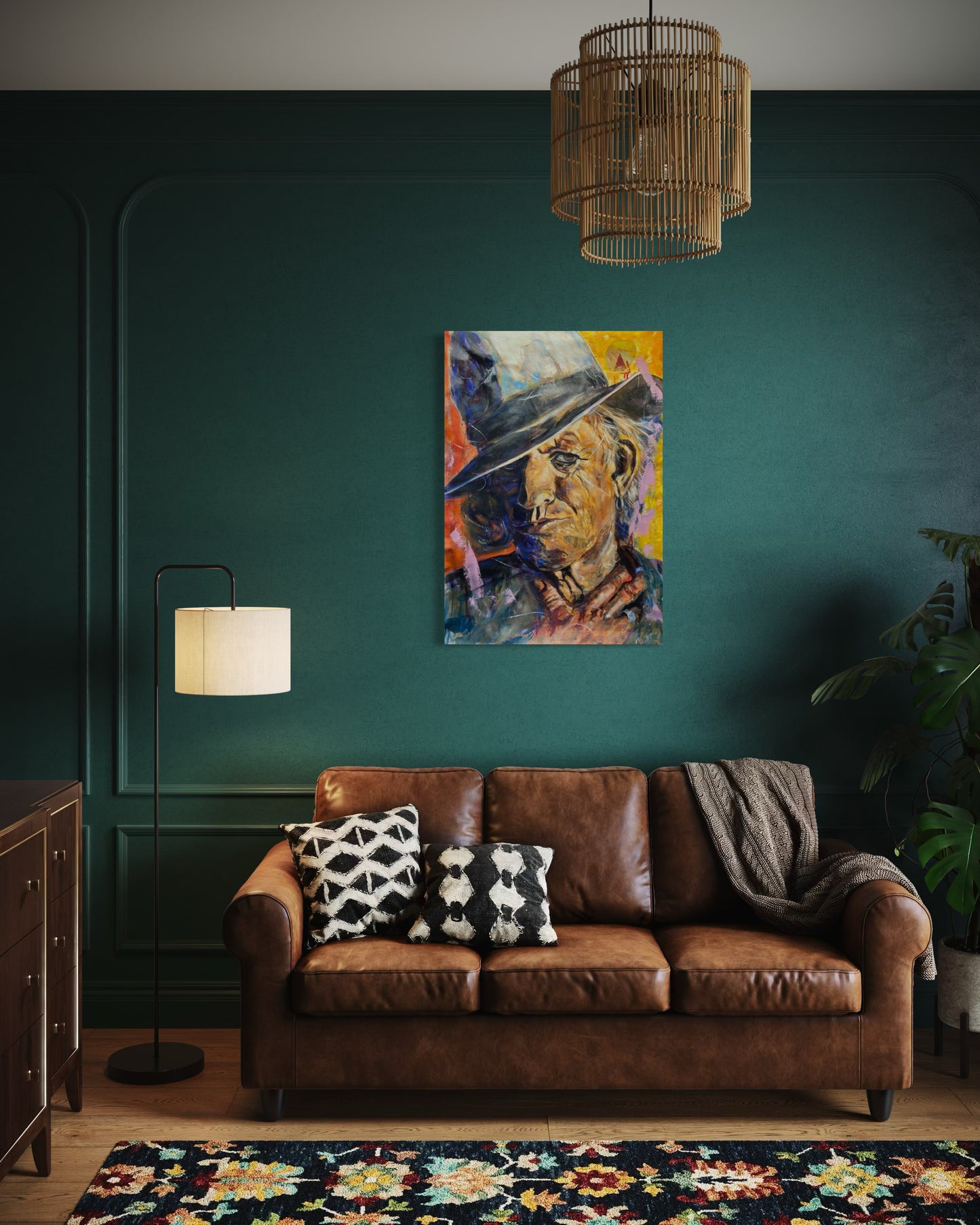 Keith Richards Painting above a leather couch with dark green wall