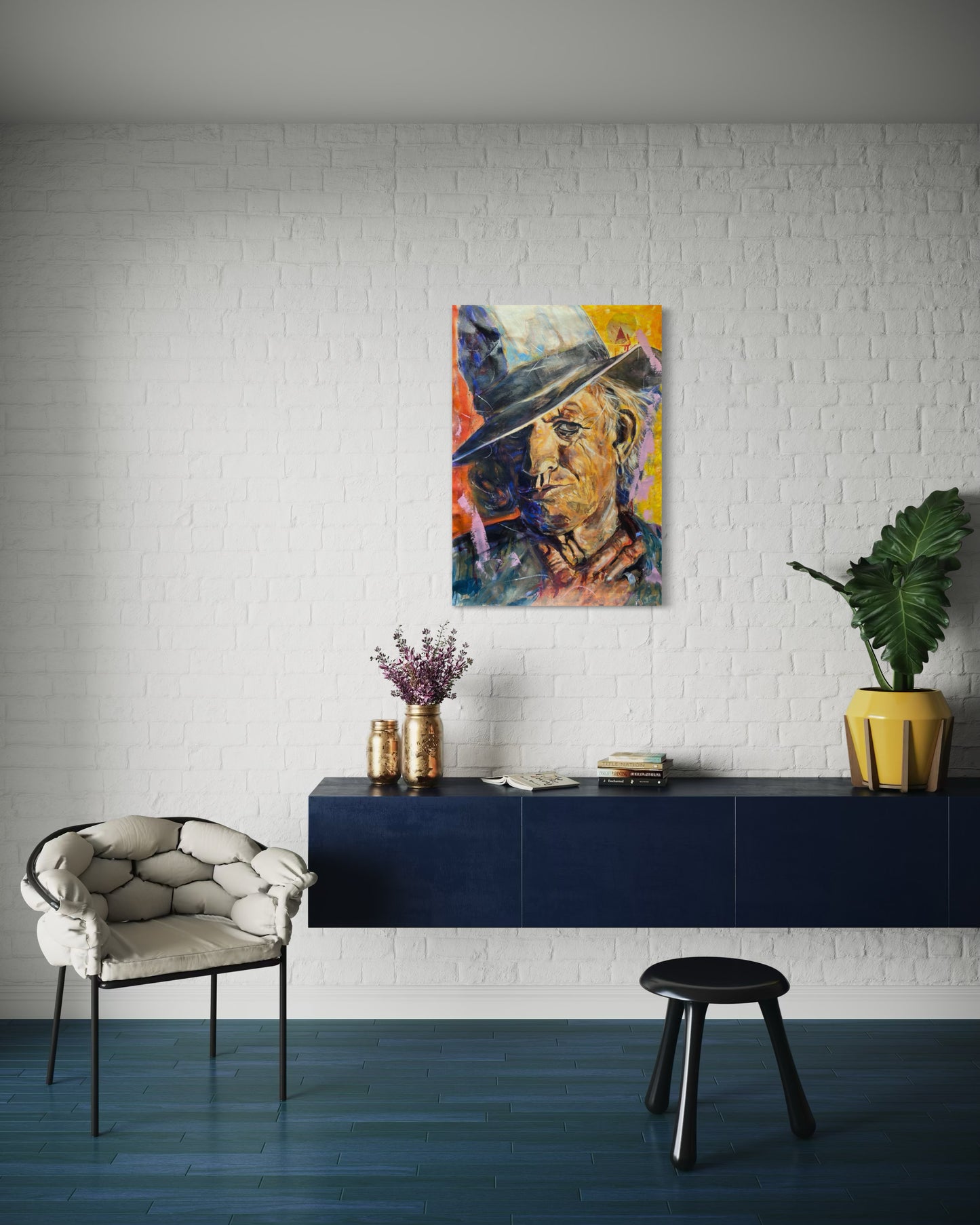 Keith Richards Painting above blue dresser with white wall