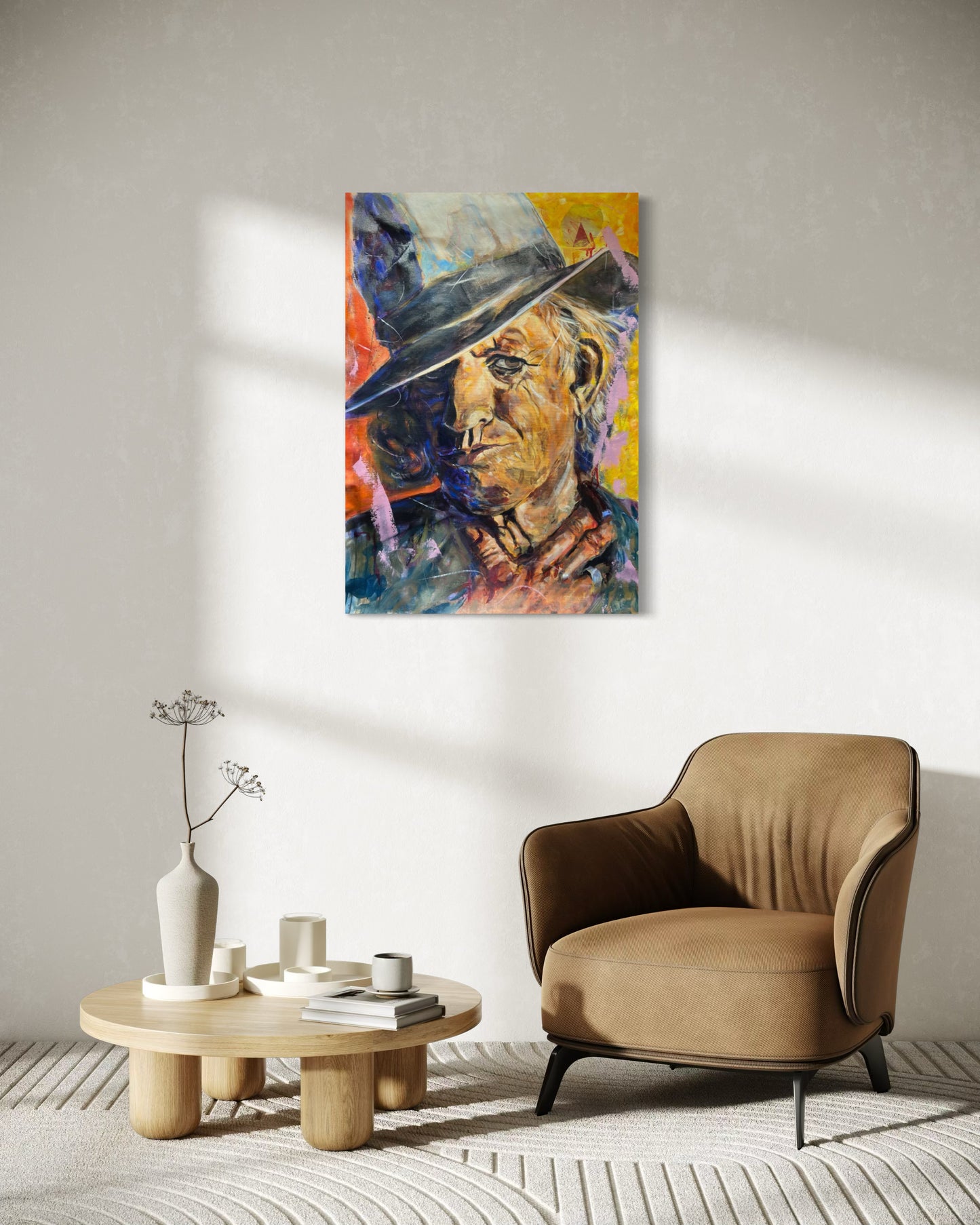 Keith Richards Painting above sofa armchair and small table for reading