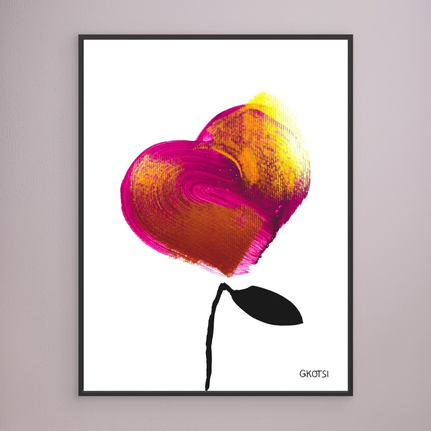 LOVE canvas print with black frame showing heartfelt design elements