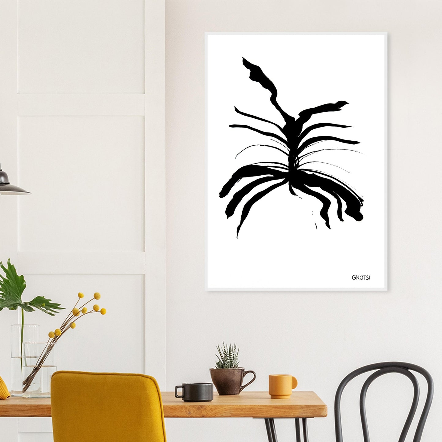 MELTING poster print above breakfast table in dining area