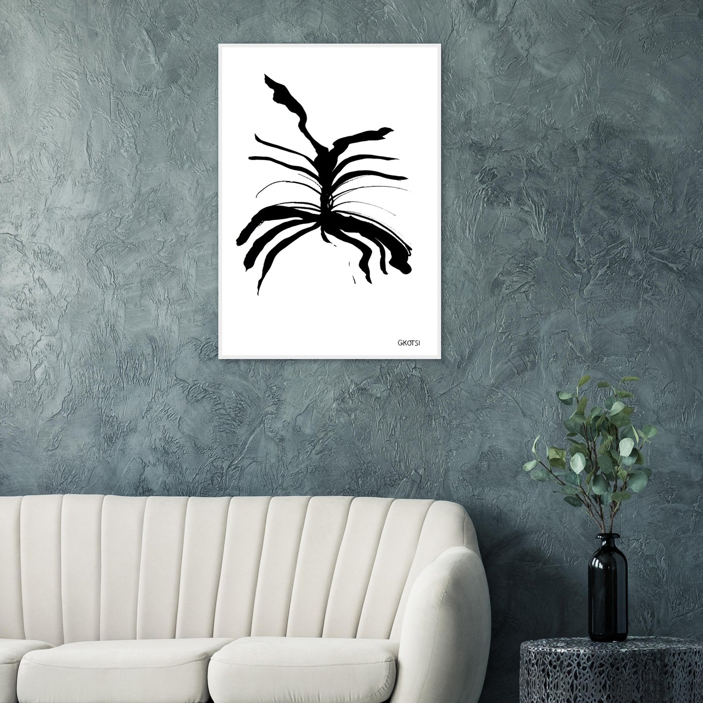 MELTING poster print above grey sofa in living room