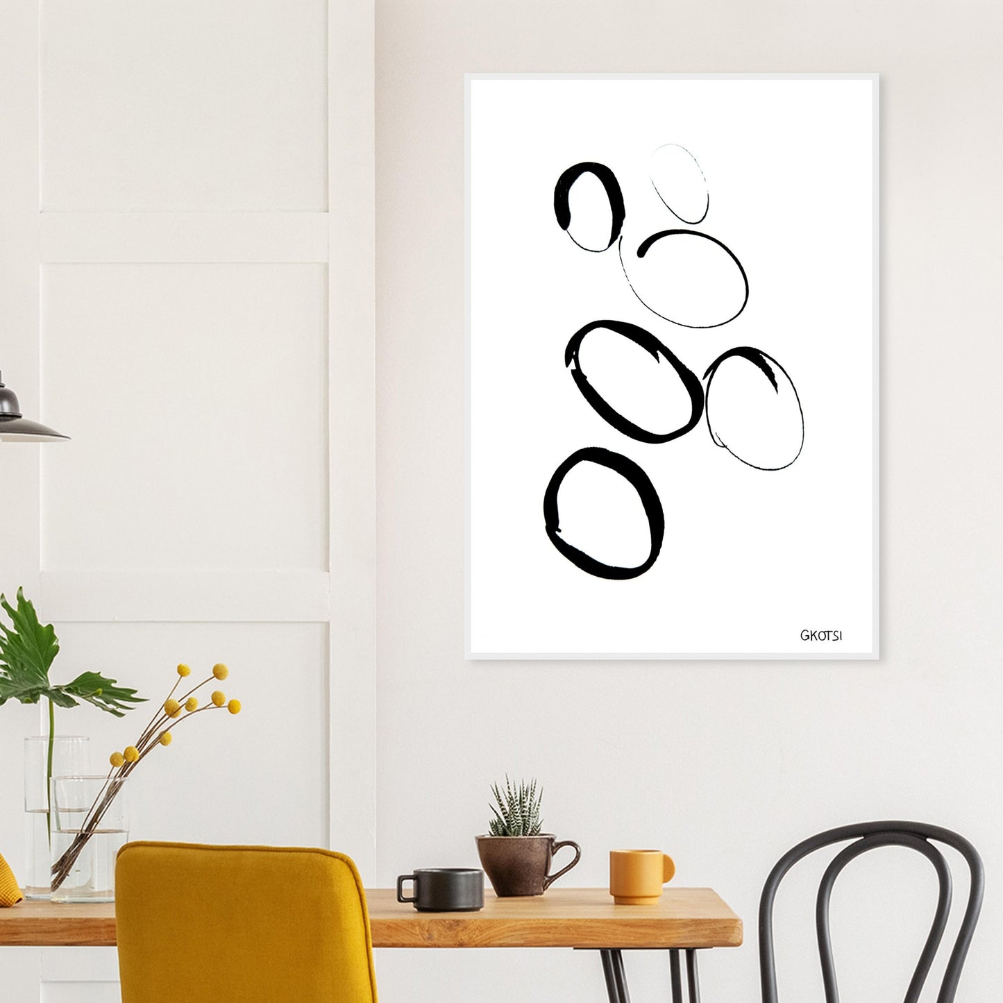 MULTIPLE poster print above breakfast table in dining area