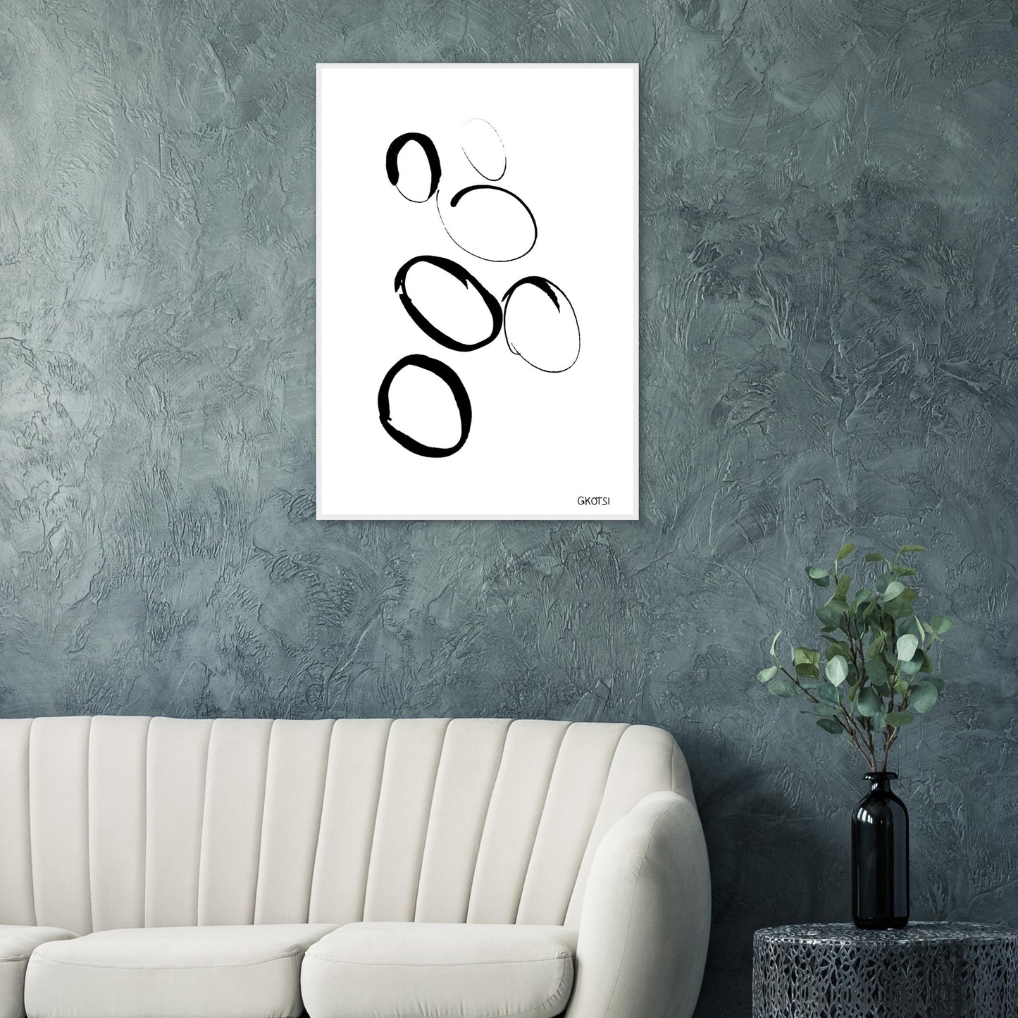 MULTIPLE poster print above grey sofa in living room