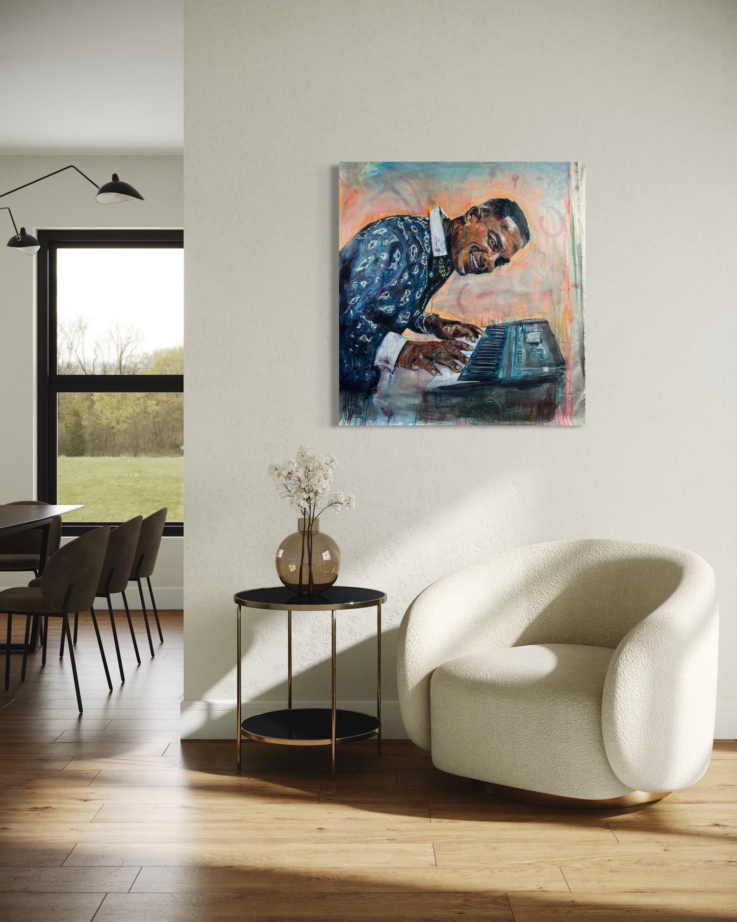 Manolito y su Trabuco above white sofa with cushion sand vase