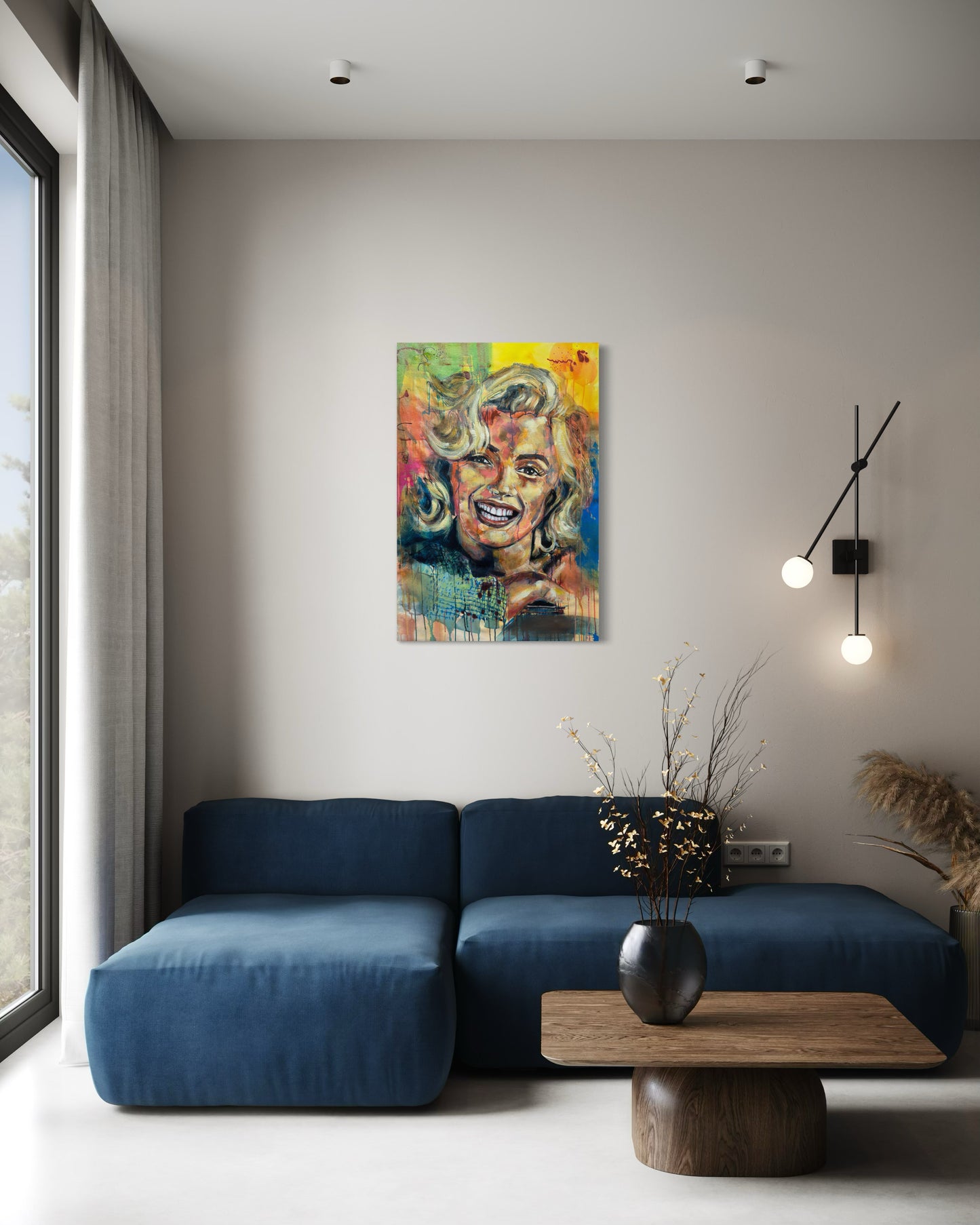 Marilyn Monroe Portrait Painting above blue velvet couch