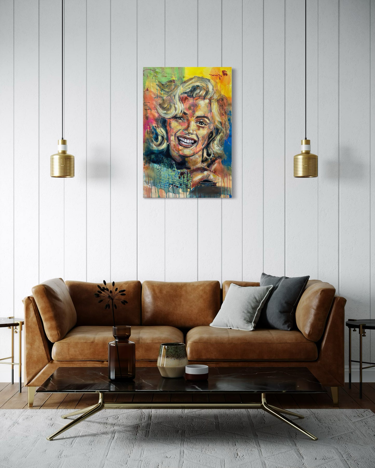 Marilyn Monroe Portrait Painting above leather armchair between two pendant lamps