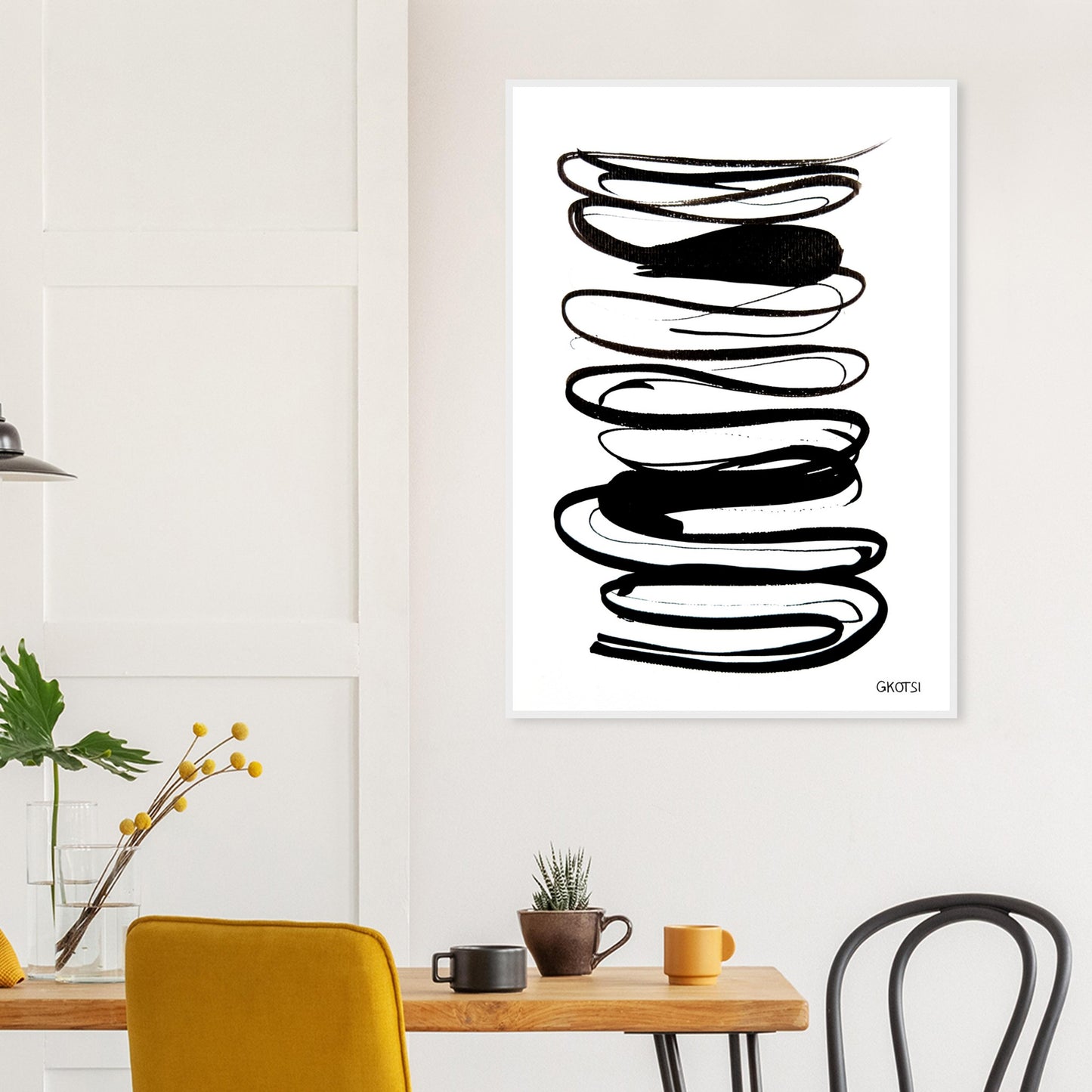 N FLOW poster print above breakfast table in dining area