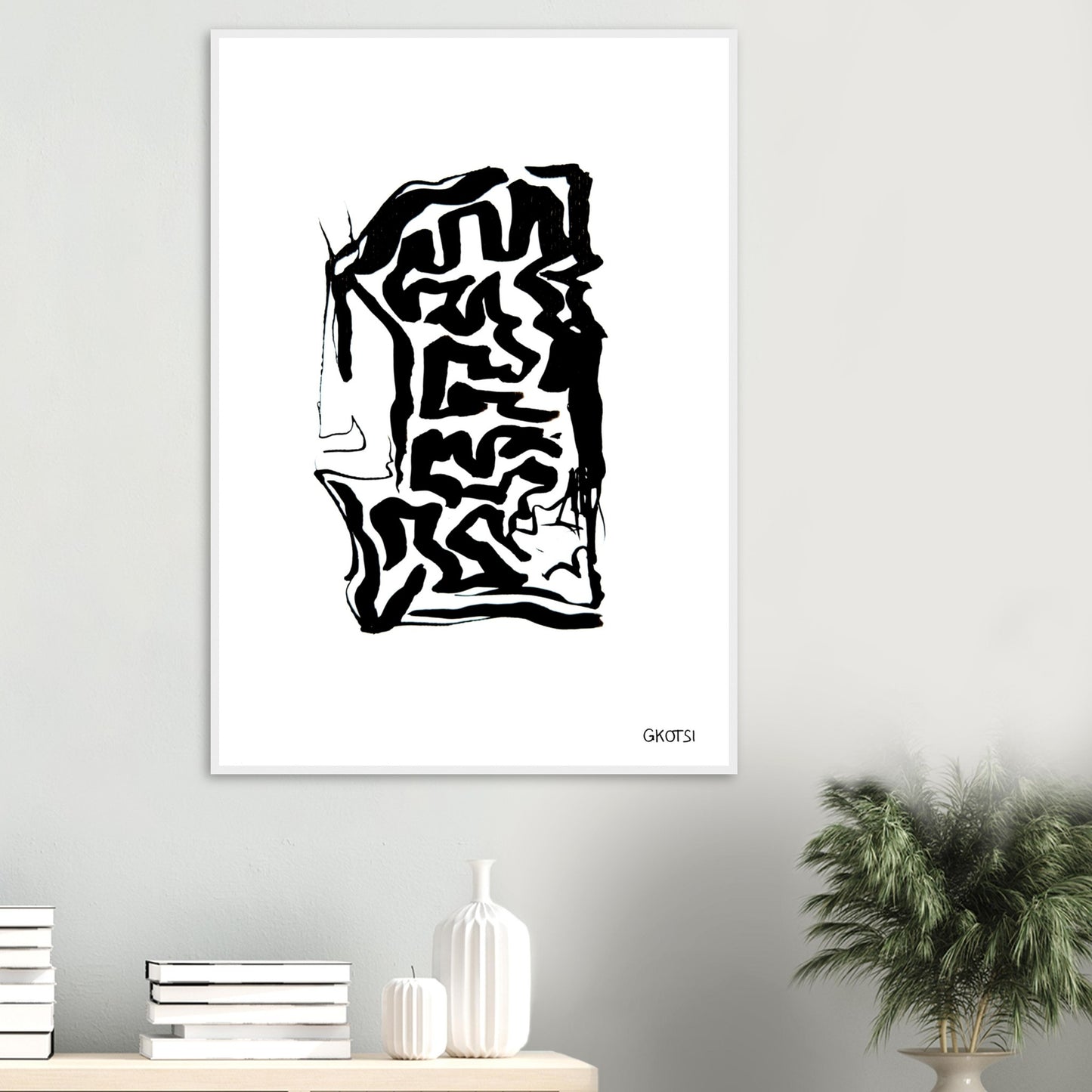 TRANSFORMING poster print above table with small plant