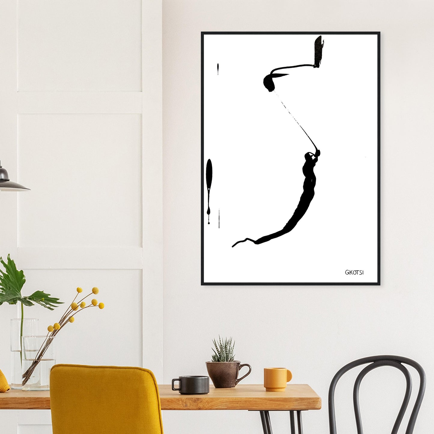 YOU ARE poster print above breakfast table in dining area