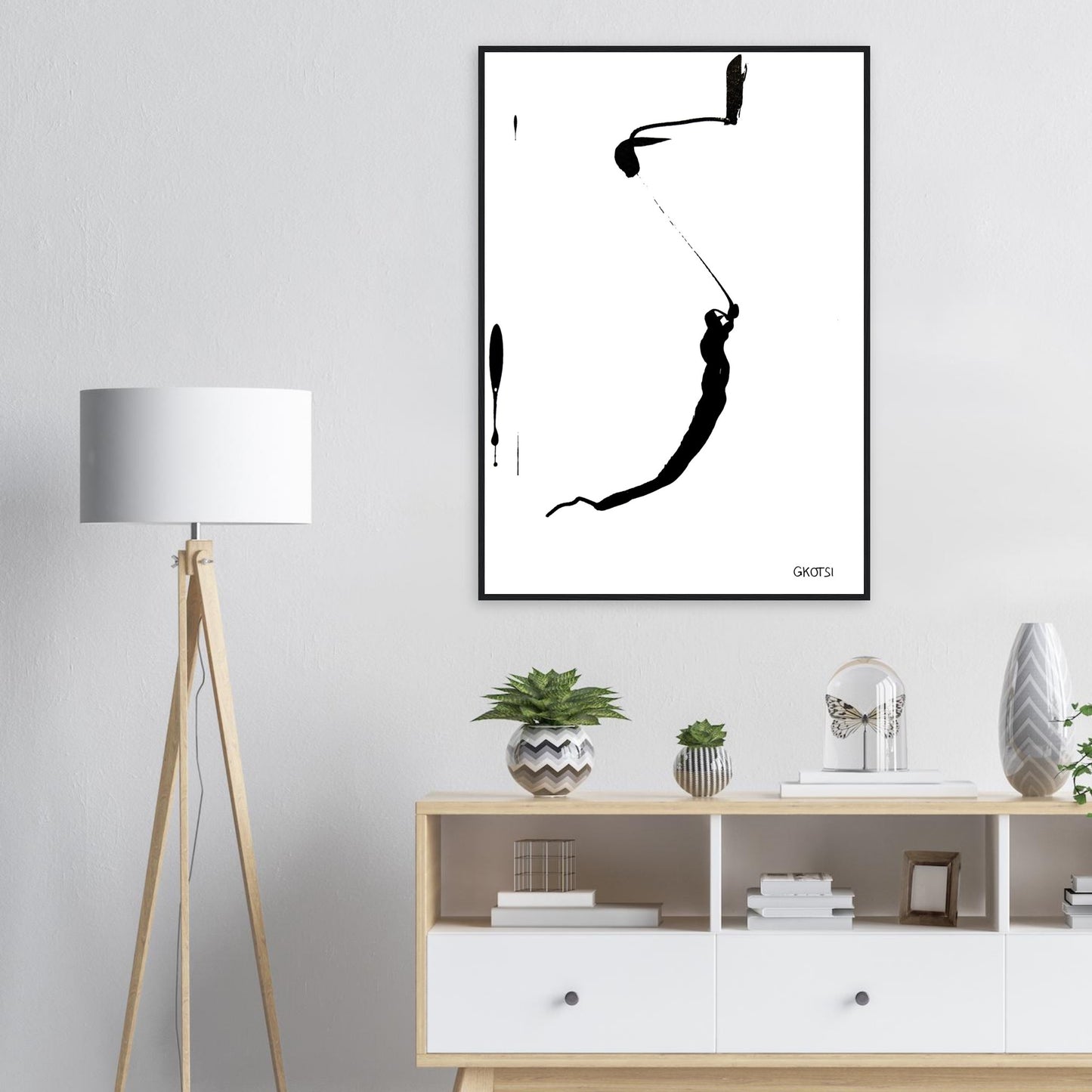 YOU ARE poster print above dresser in room interior