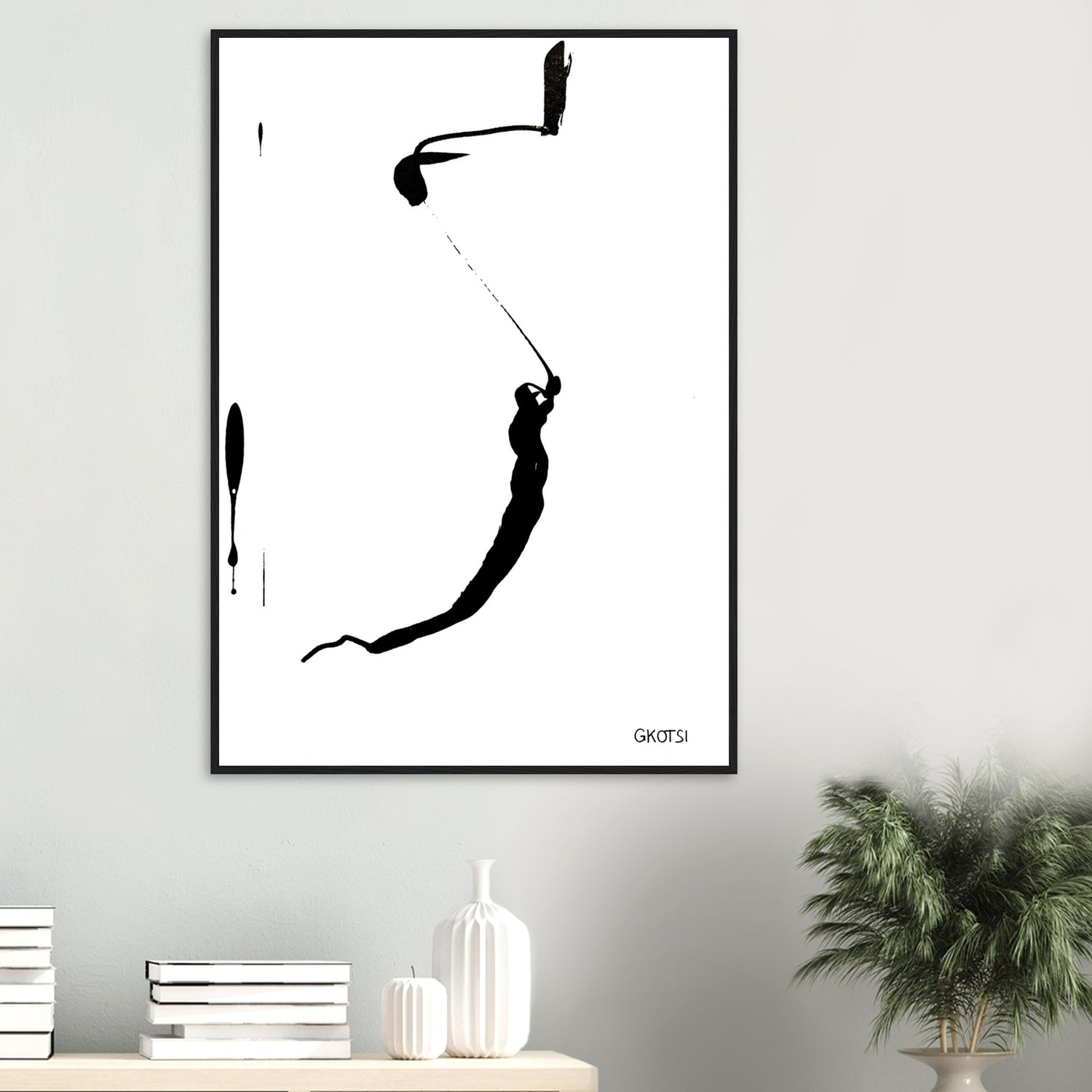 YOU ARE poster print above table with small plant