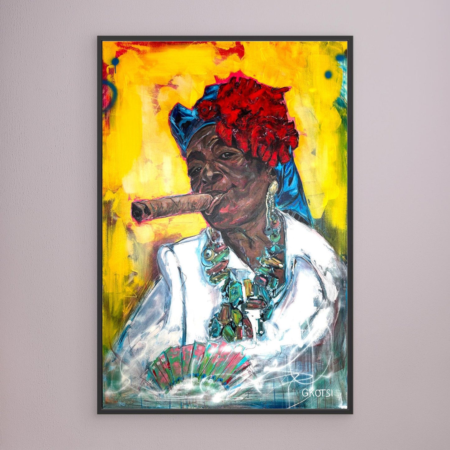 CUBAN WOMAN WITH CIGAR Canvas Print by Elena Gkotsi with black frame displayed on modern gray wall