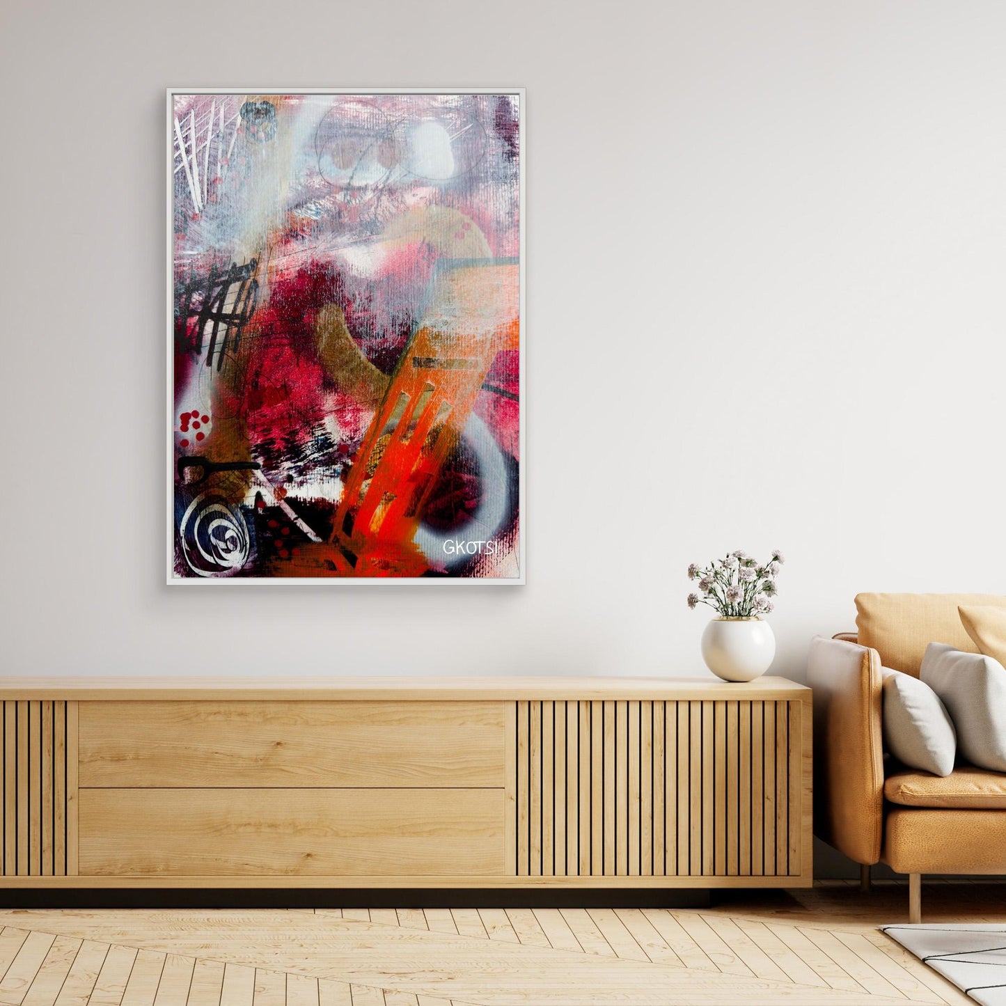 FEUER Abstract Canvas Print hanging over console table with small plant