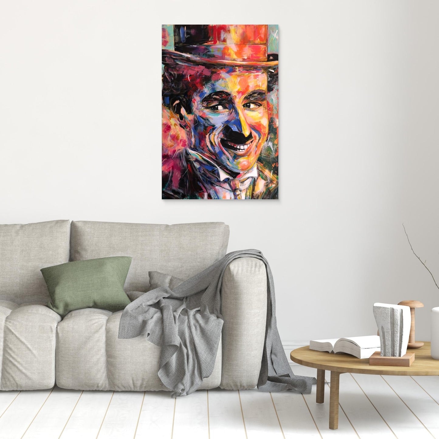 CHARLIE CHAPLIN canvas print hanging above gray sofa