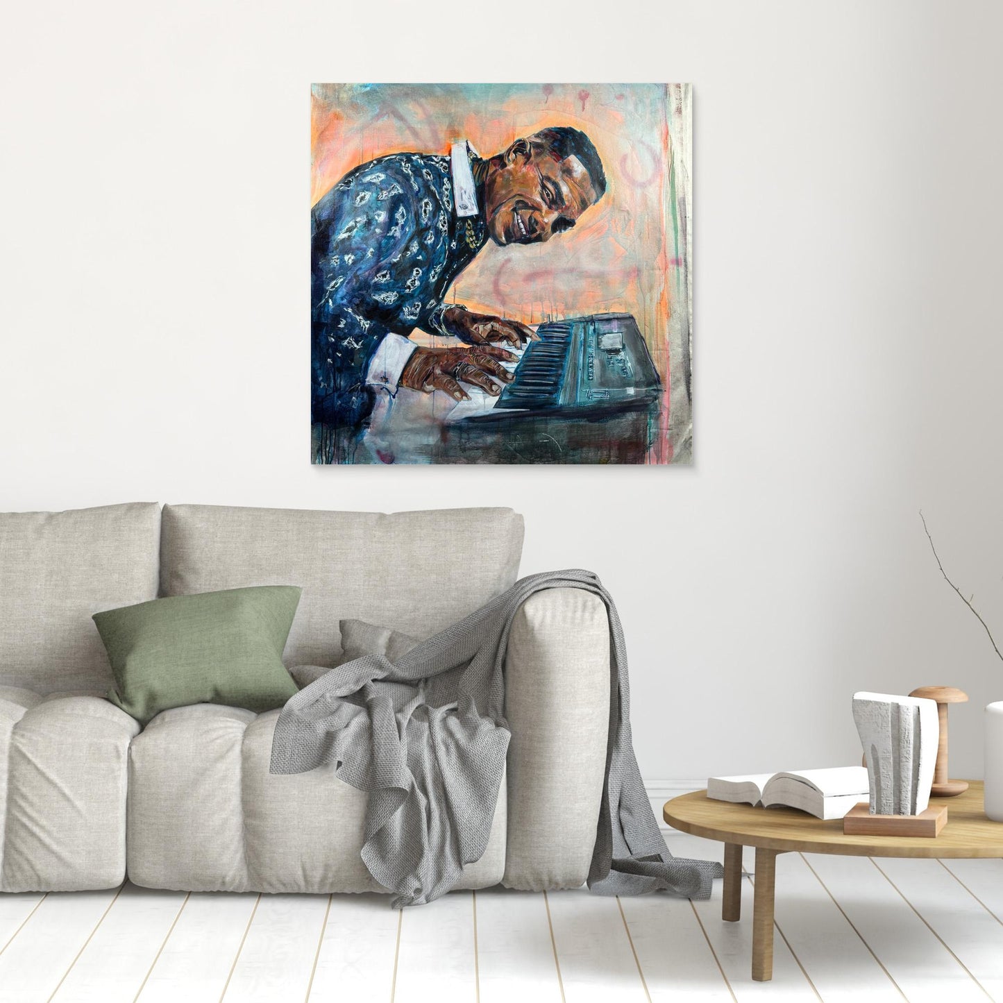 MANOLITO Y SU TRABUCO canvas print hanging above gray sofa