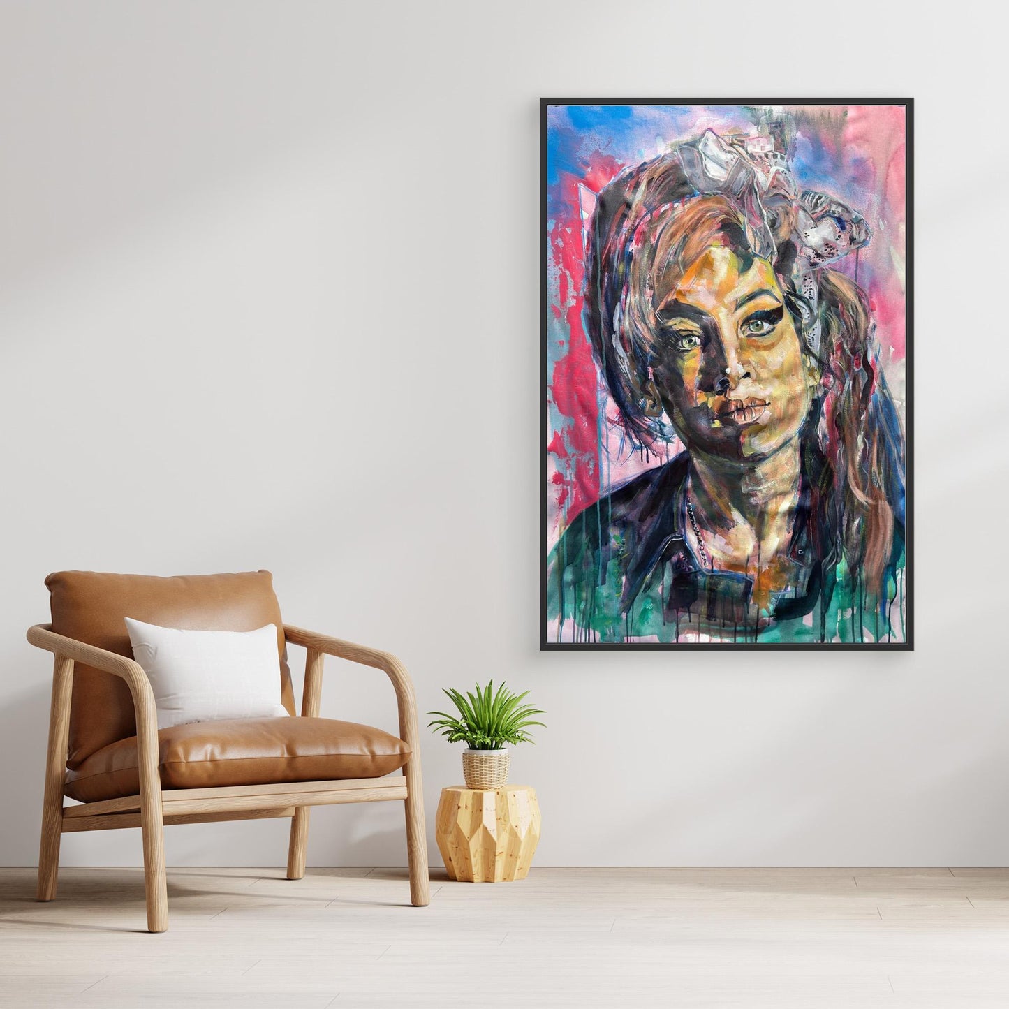 AMY WINEHOUSE 2 canvas artwork displayed above stylish chair