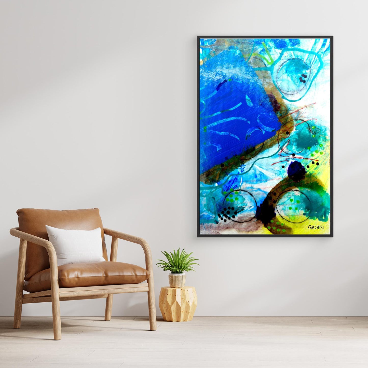 UNTER WASSER Abstract Canvas Print hanging over small plant and contemporary chair in scandinavian style room