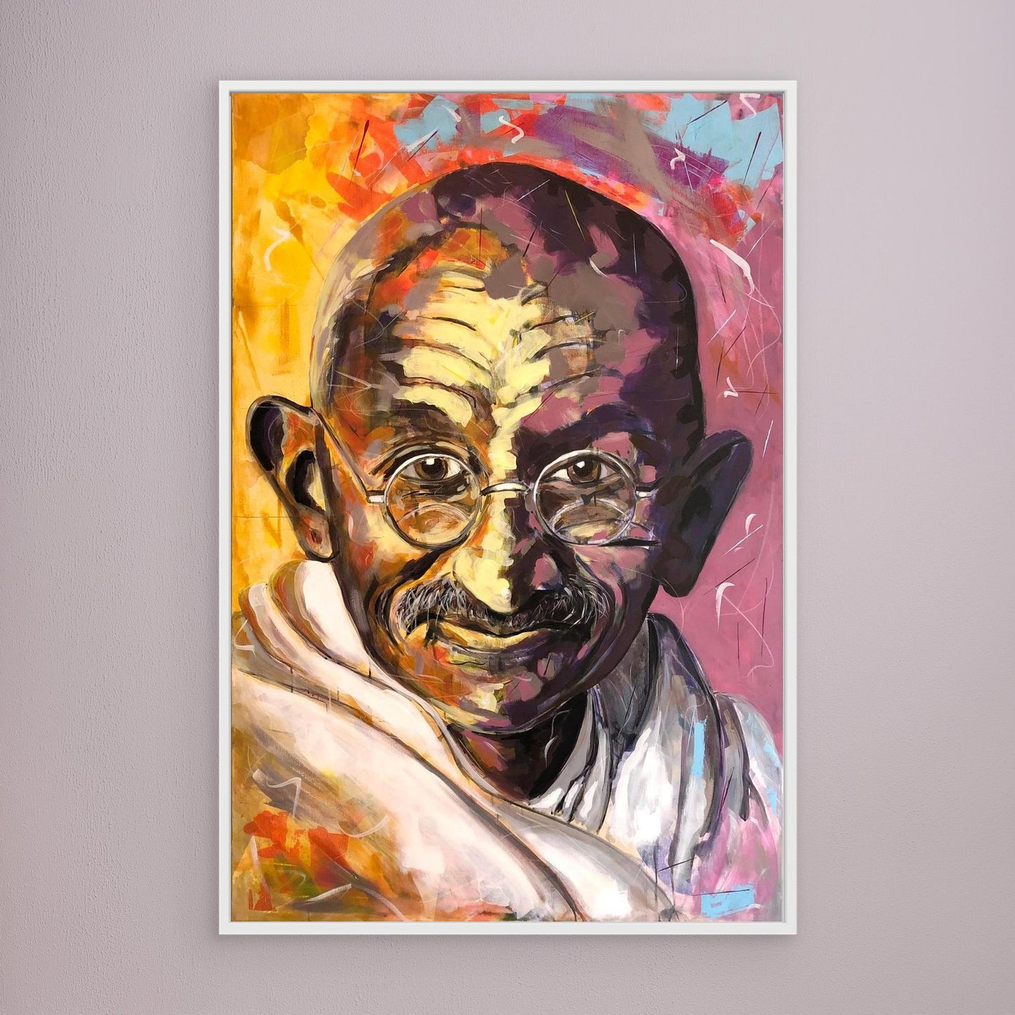 GANDHI canvas print with white frame on wall