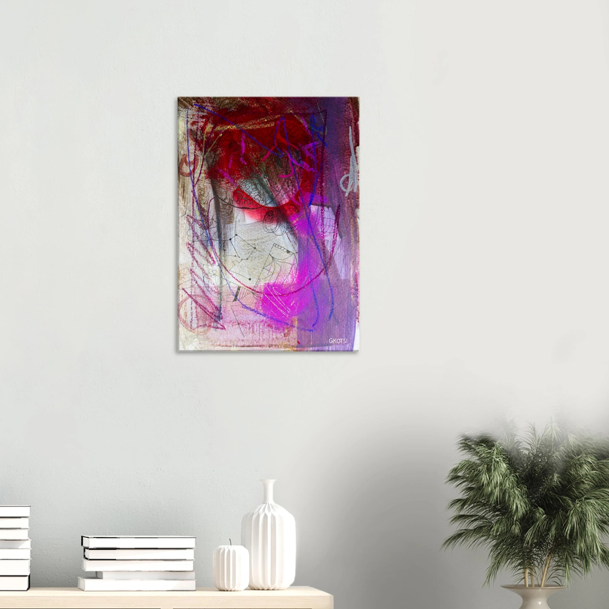 GROOVY canvas print above wooden table with small plant