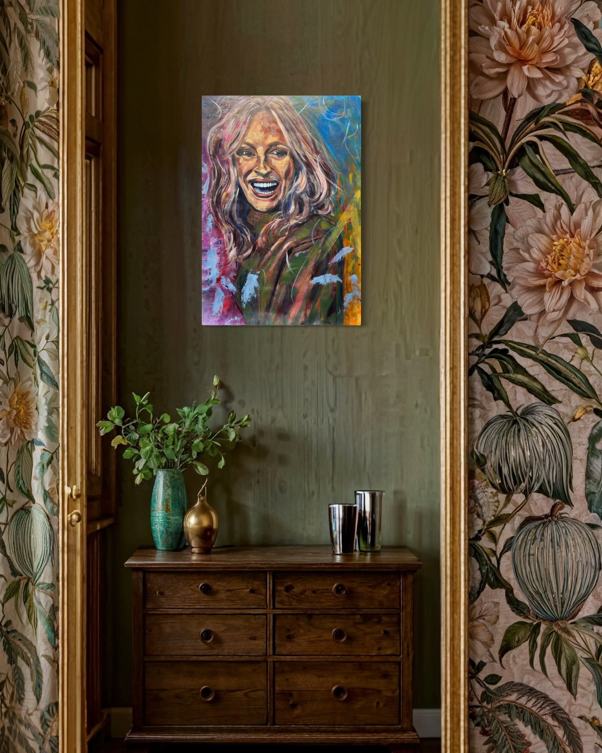 Julia Roberts Painting above small wooden dresser with flower vase