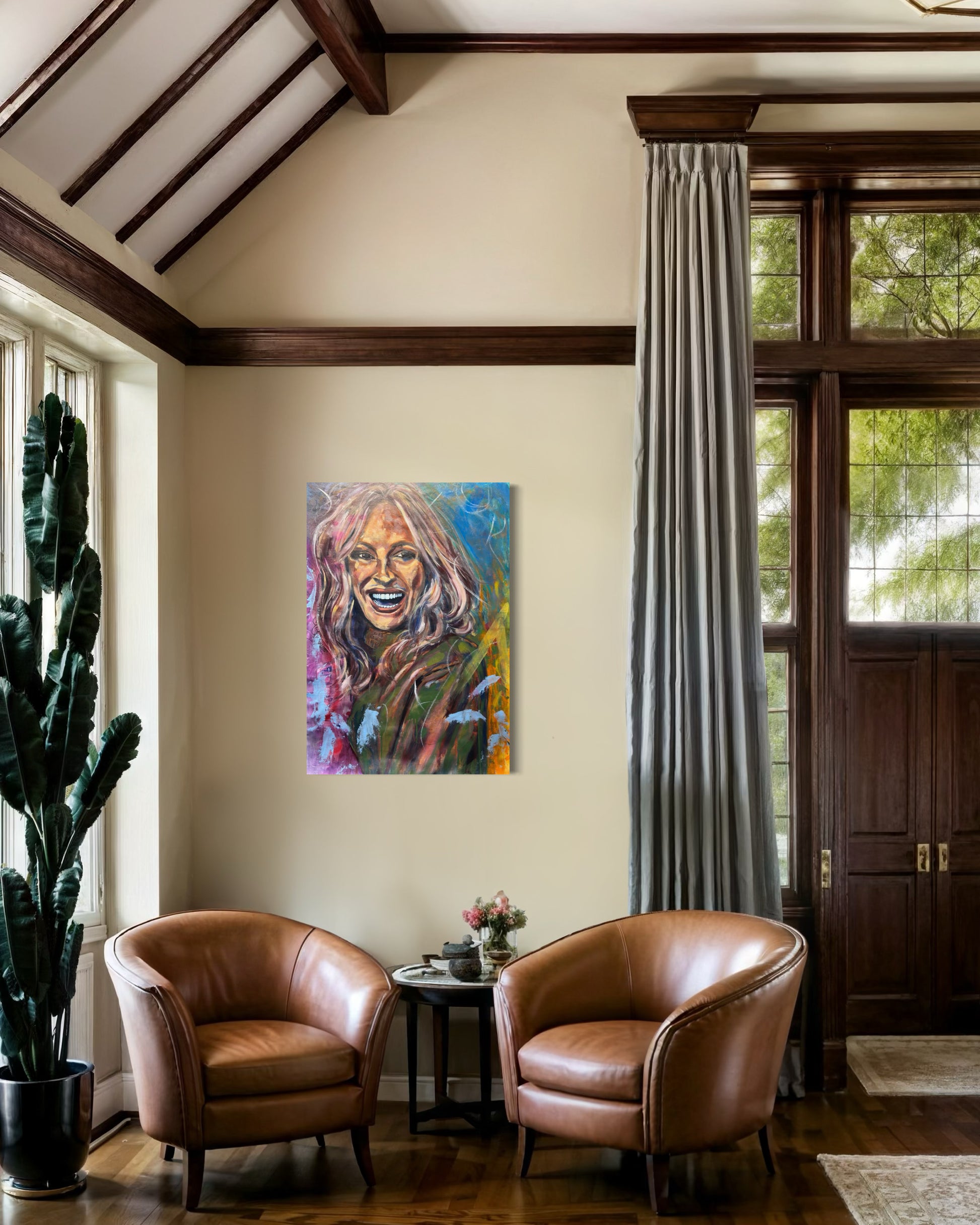 Julia Roberts Painting in living room with two leather arm chairs