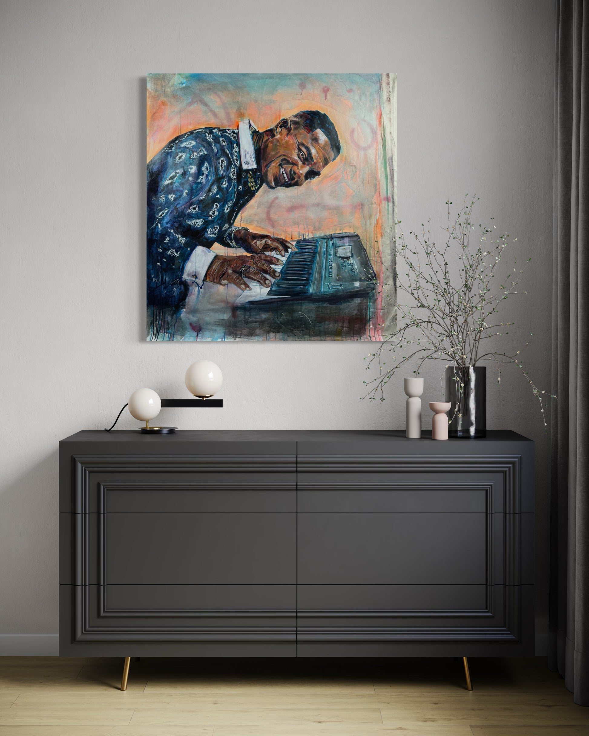  Manolito y su Trabuco above a gray dresser